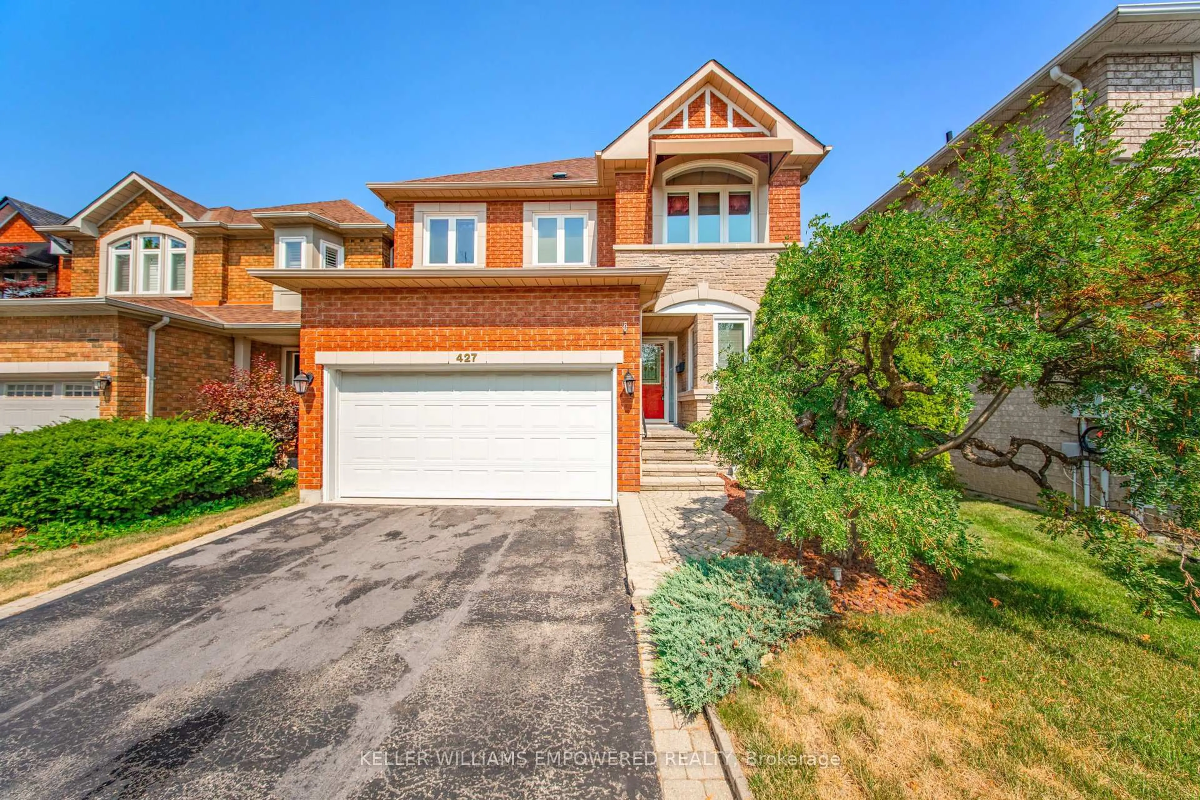 Home with brick exterior material, street for 427 Grand Highland Way, Mississauga Ontario L4Z 3W1