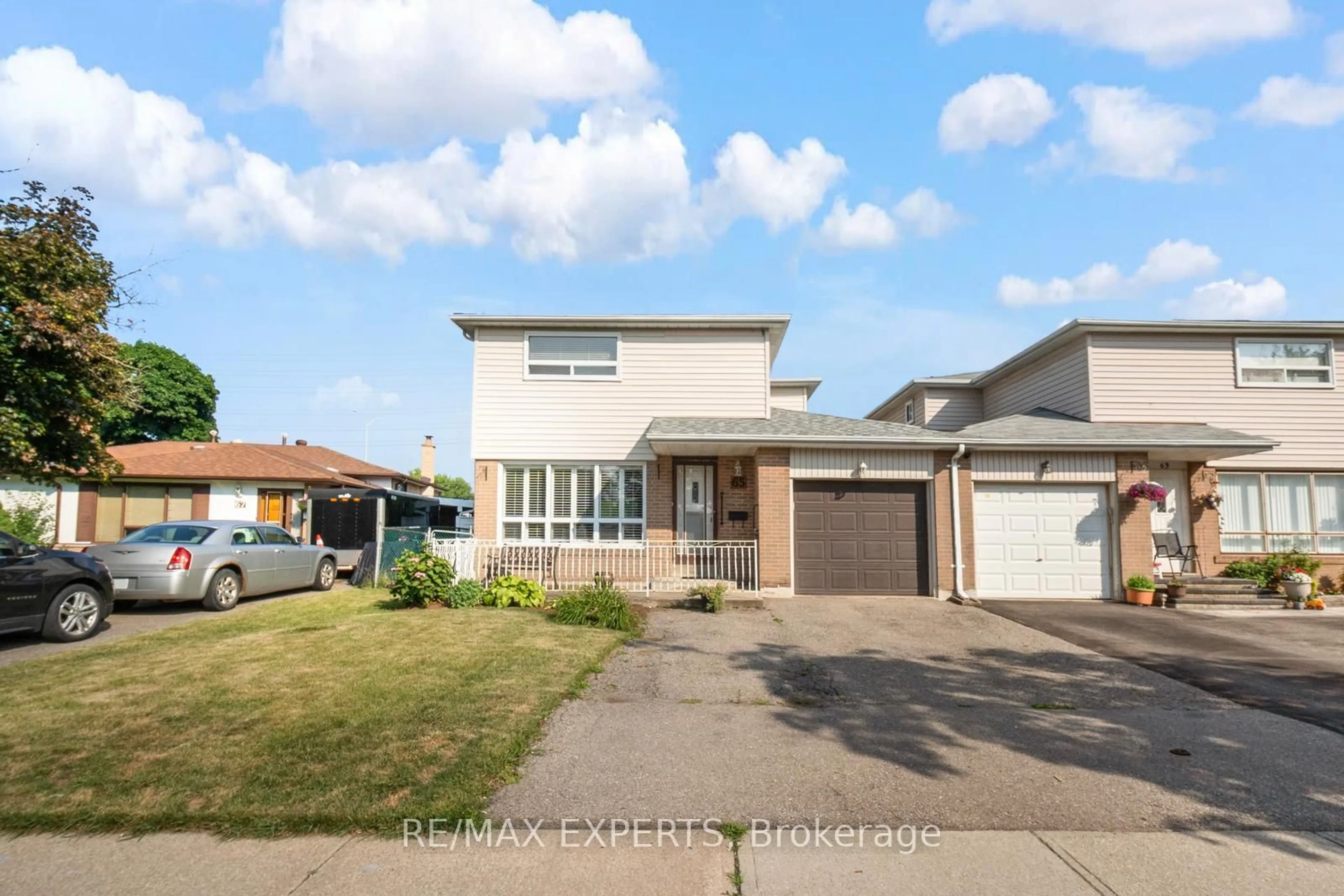 Home with vinyl exterior material, street for 65 Garside Cres, Brampton Ontario L6S 1H5