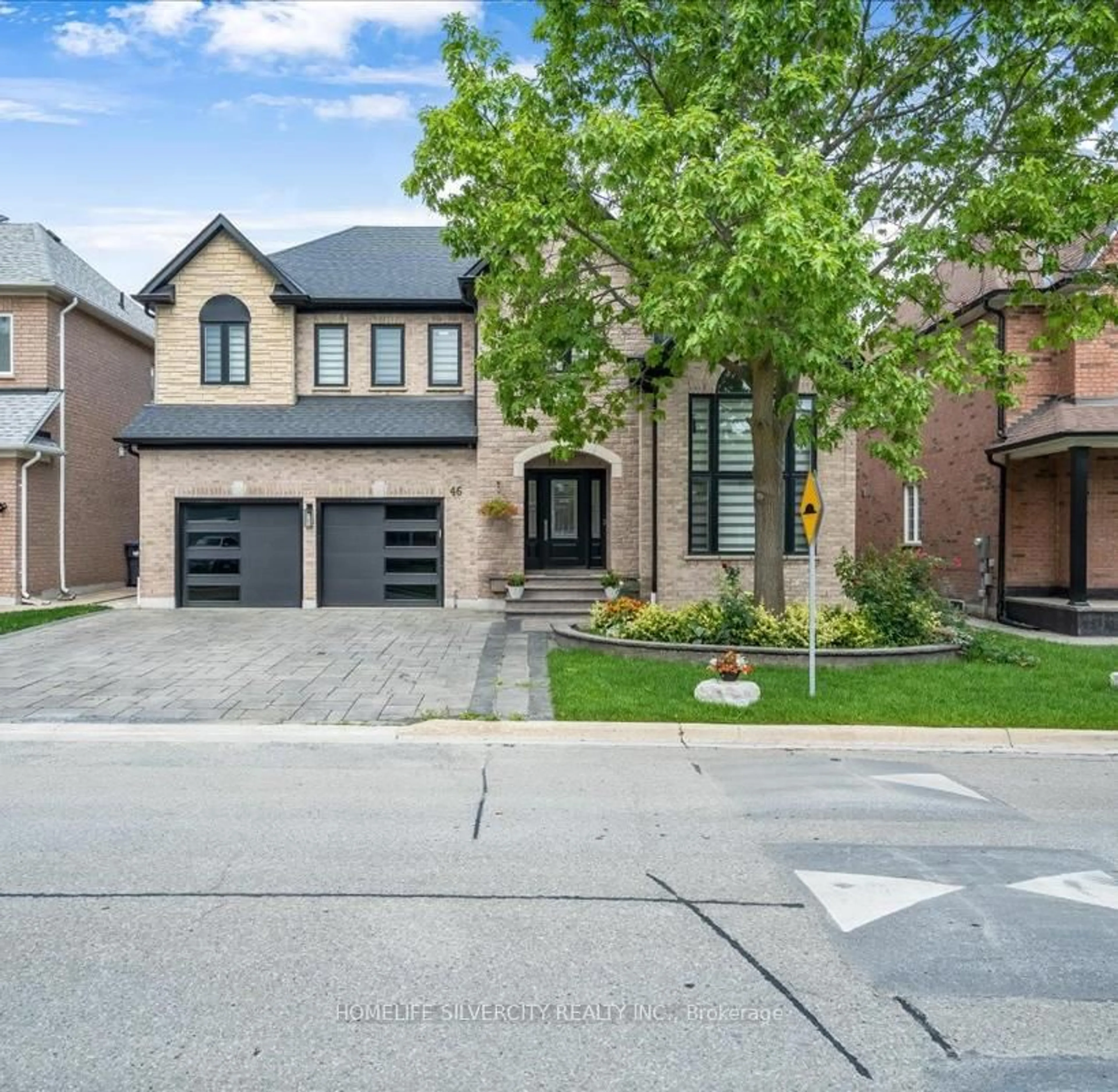 Home with brick exterior material, street for 46 Treeline Blvd, Brampton Ontario L6P 1E4