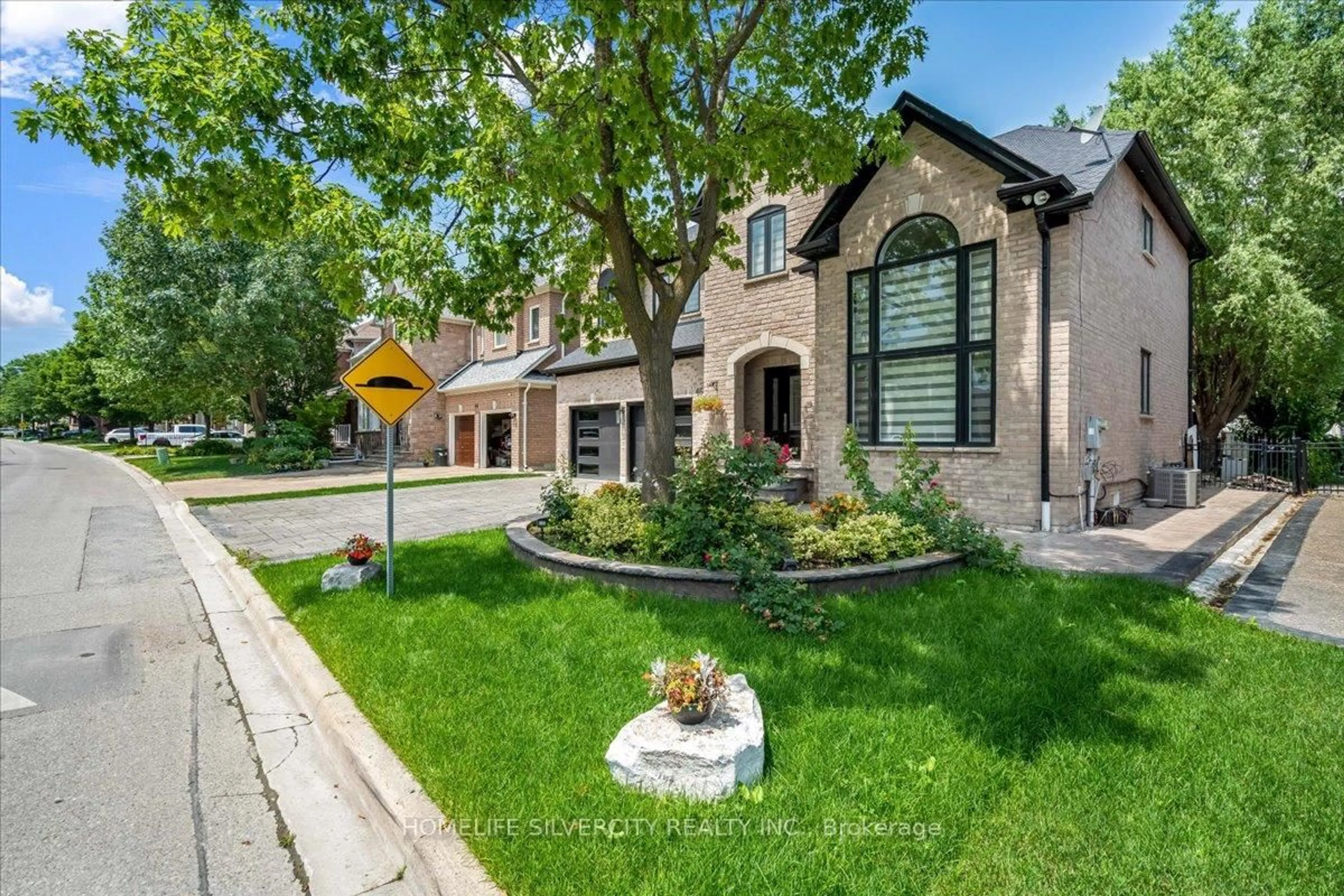Home with brick exterior material, street for 46 Treeline Blvd, Brampton Ontario L6P 1E4