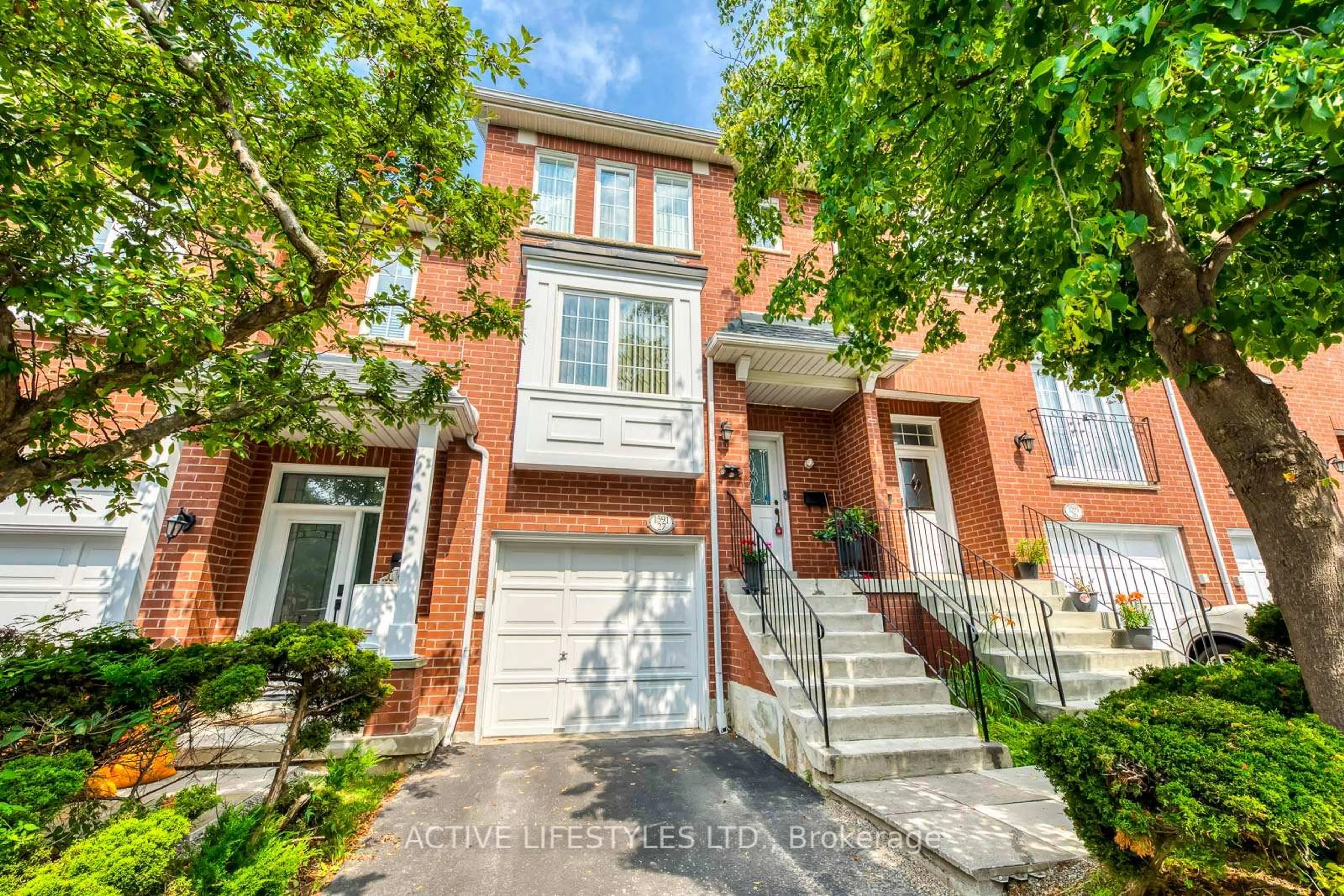 Home with brick exterior material, street for 1591 South Parade Crt #27, Mississauga Ontario L5M 6G1