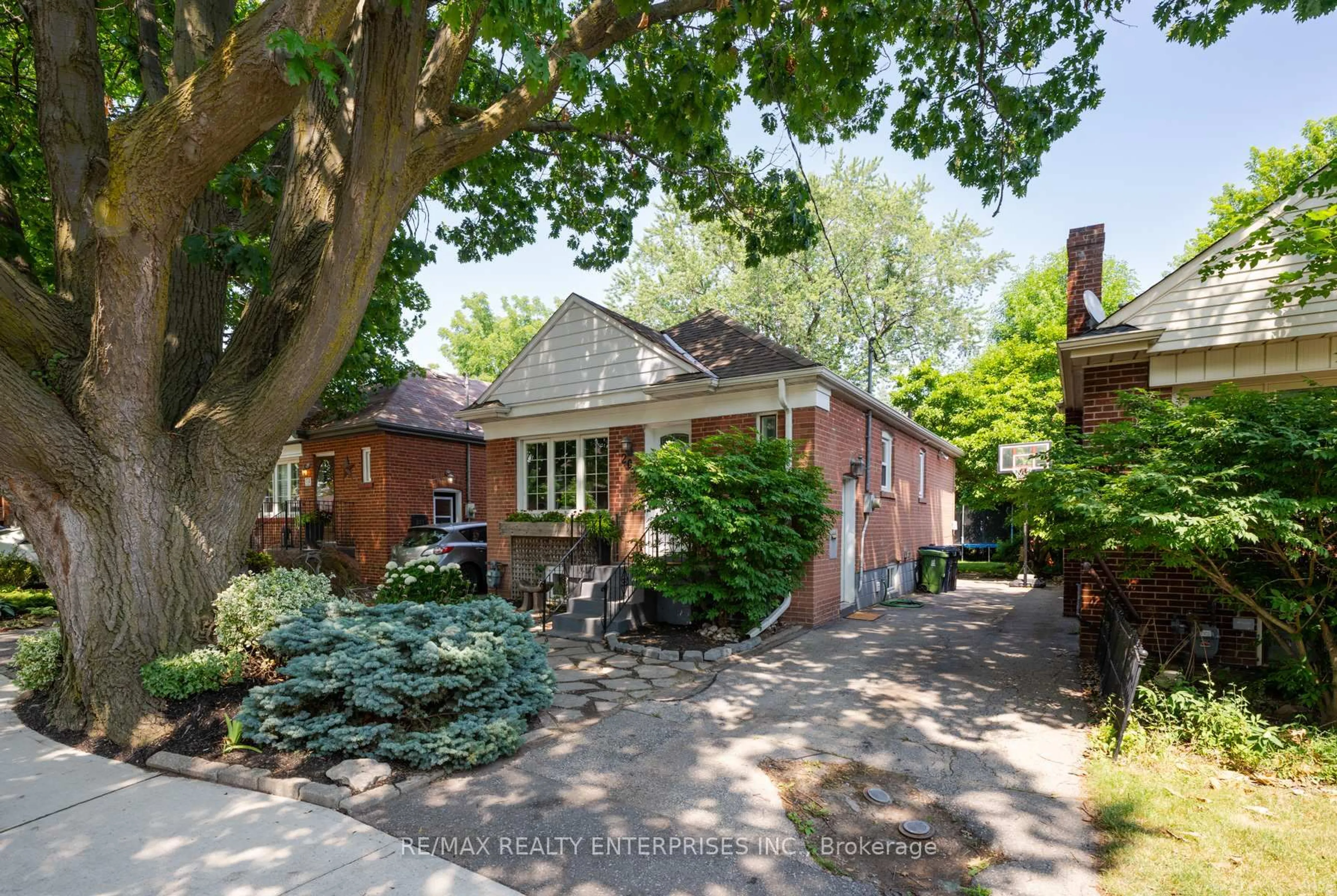 Home with brick exterior material, street for 209 Hallmark Ave, Toronto Ontario M8W 4L1