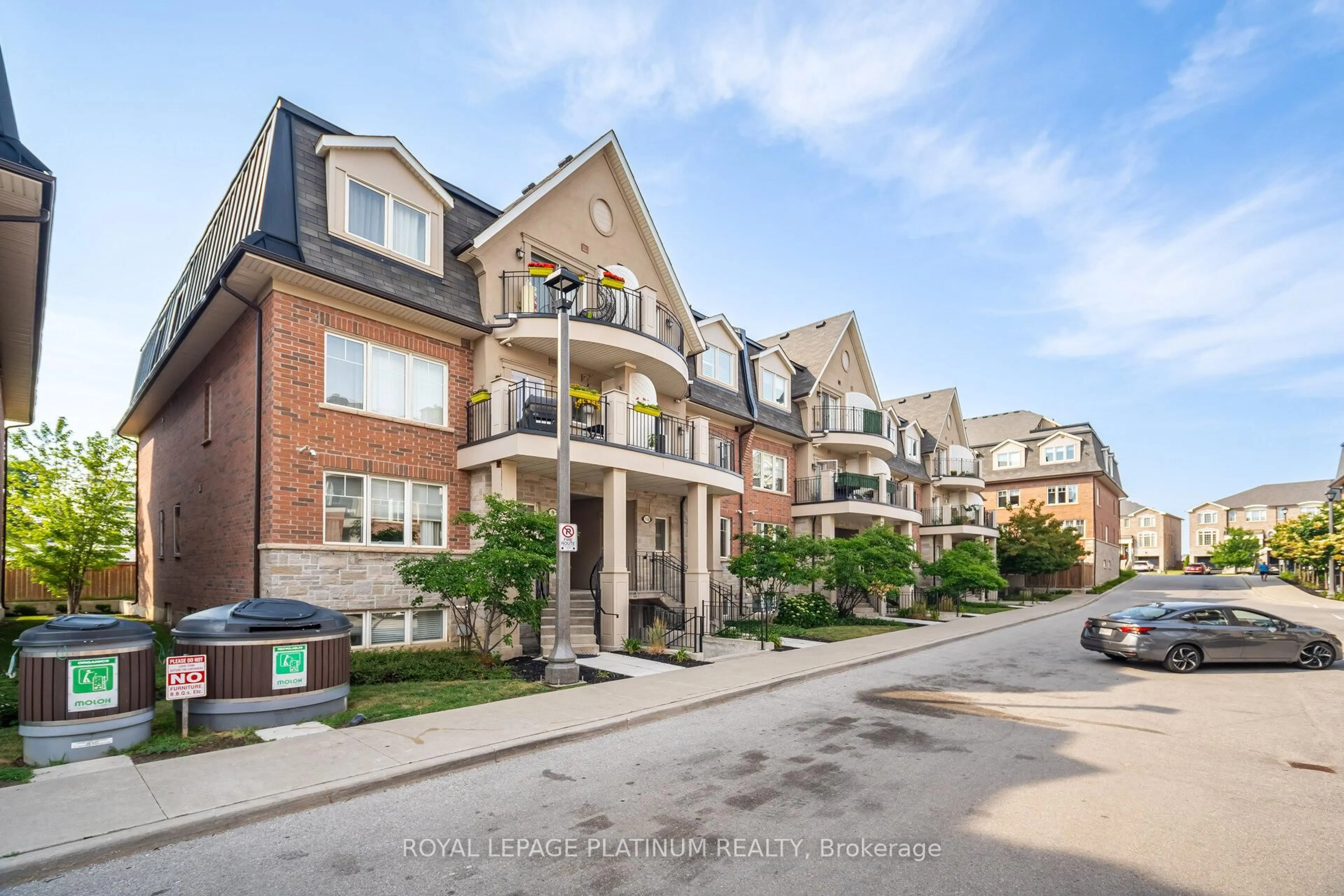 A pic from outside/outdoor area/front of a property/back of a property/a pic from drone, street for 2420 Baronwood Dr #9-01, Oakville Ontario L6M 0X6