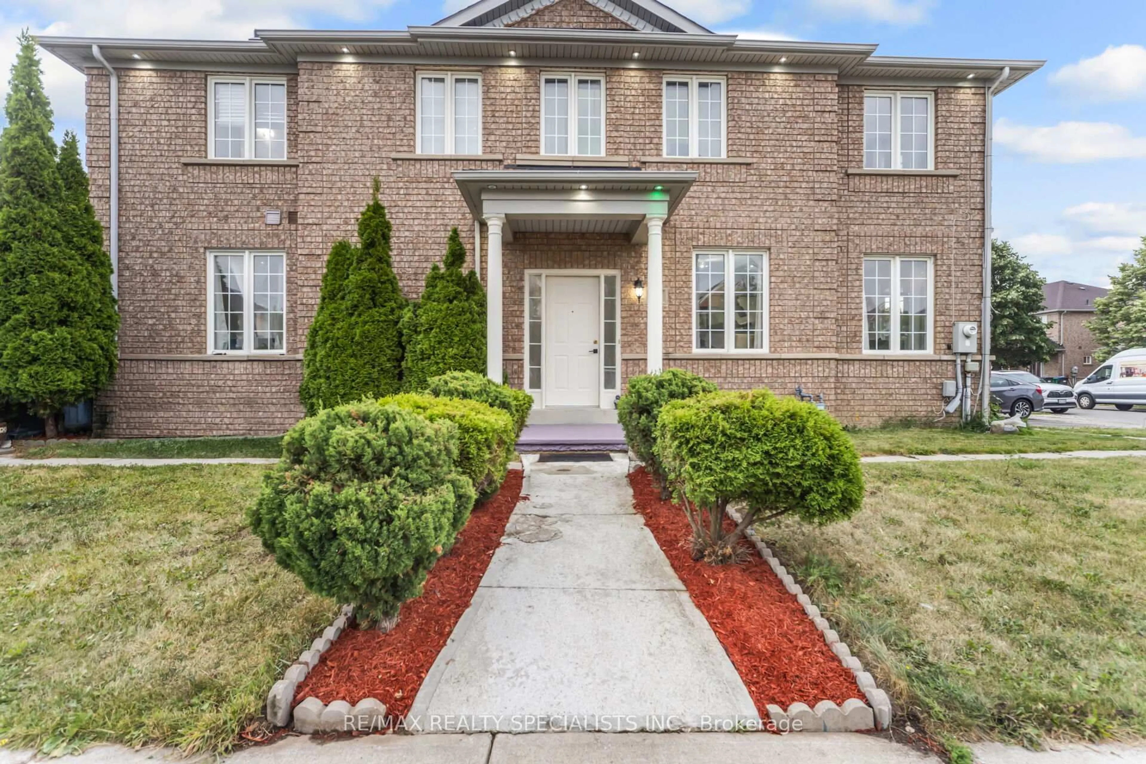 Home with brick exterior material, street for 64 Botavia Downs Dr, Brampton Ontario L7A 3N8