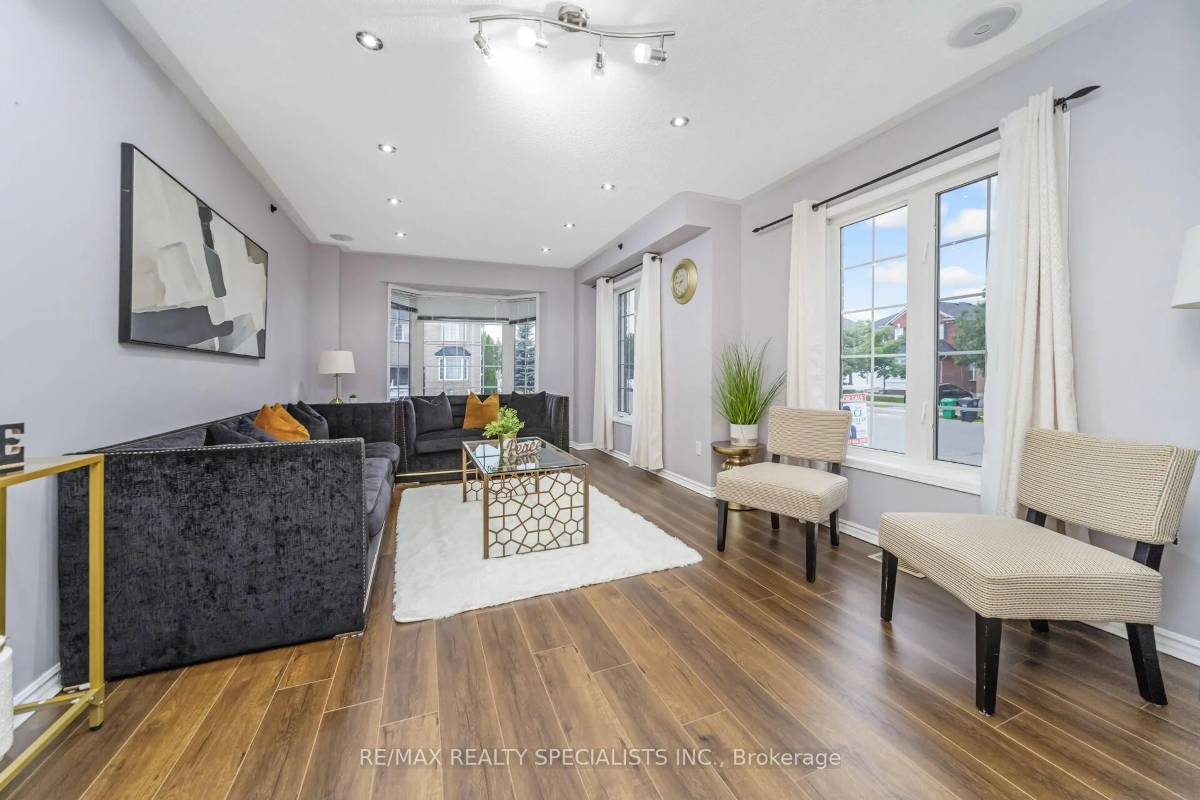Living room with furniture, unknown for 64 Botavia Downs Dr, Brampton Ontario L7A 3N8