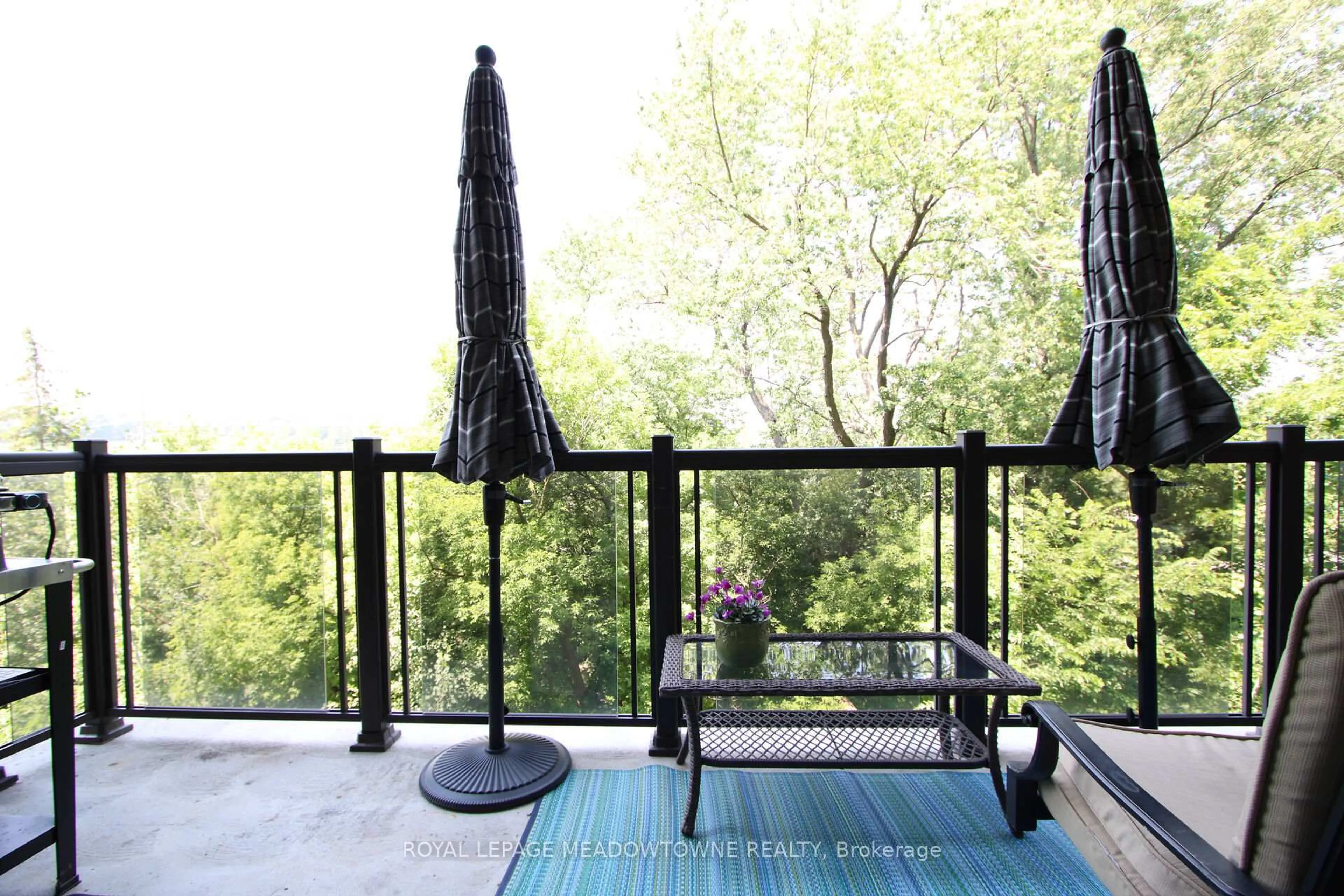 Patio, forest/trees view for 33 Whitmer St #318, Milton Ontario L9T 8P9