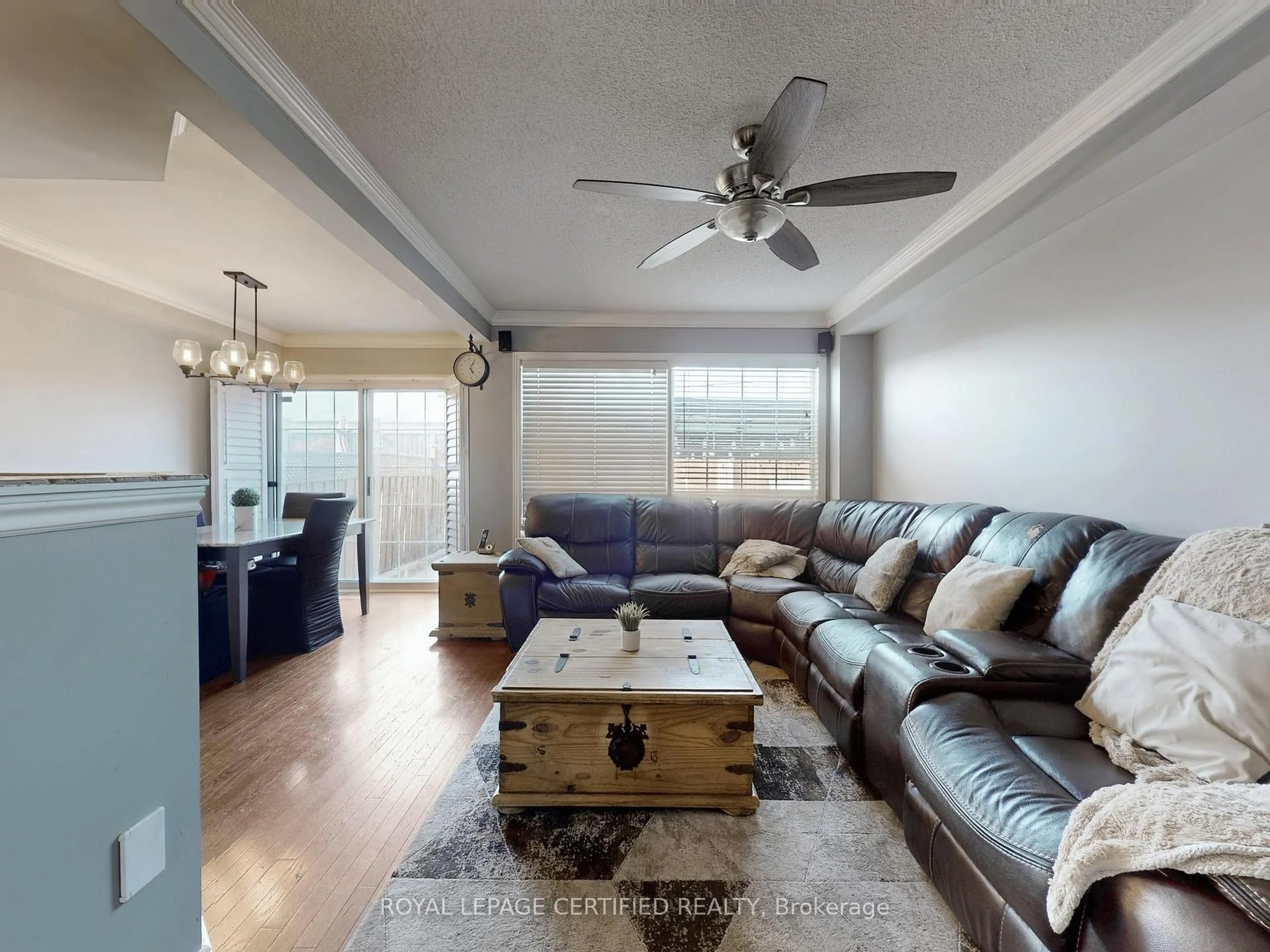 Living room with furniture, wood/laminate floor for 38 Lawren Harris Cres, Caledon Ontario L7E 2W7