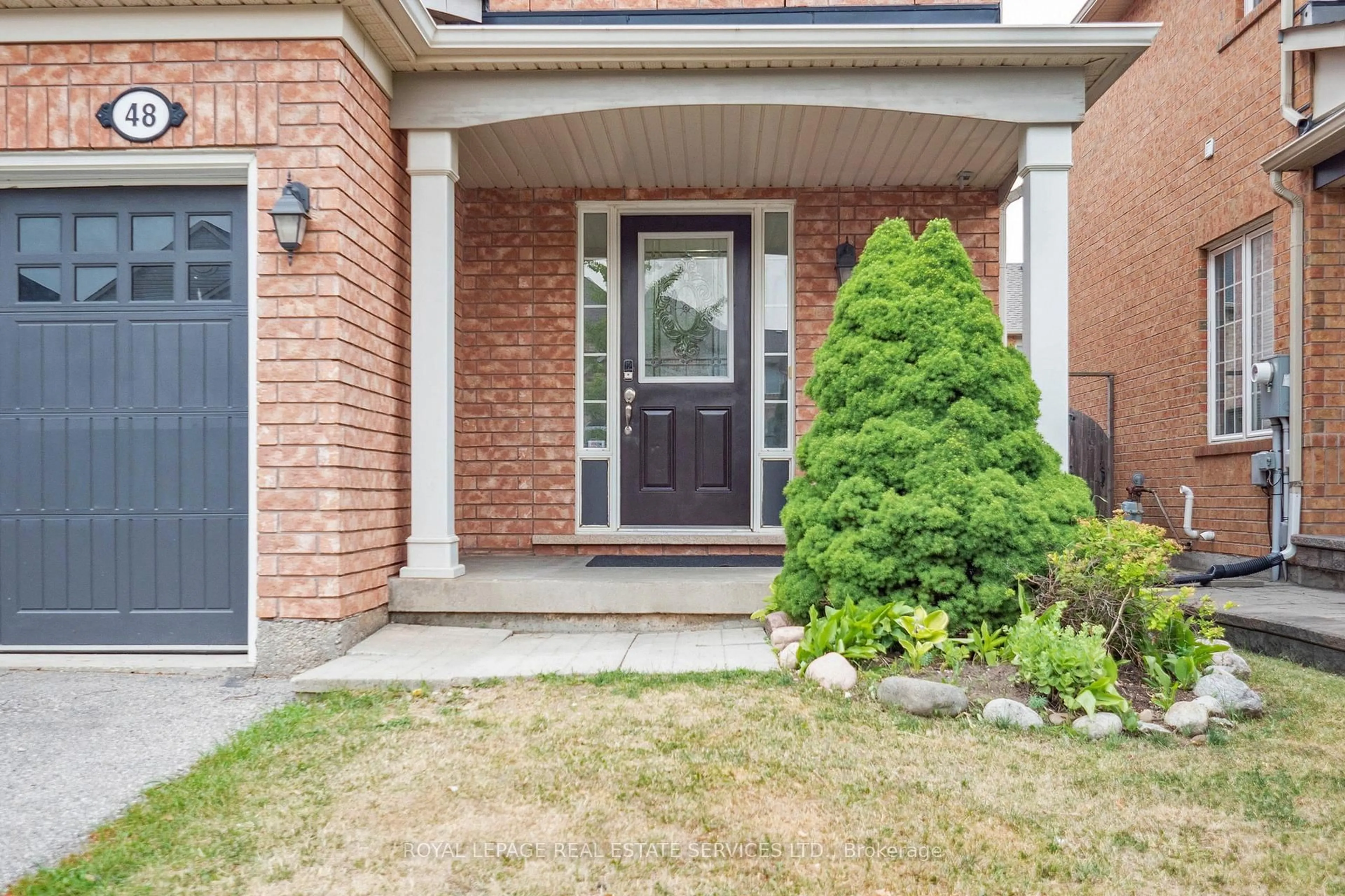 Home with brick exterior material, street for 48 Dehaviland Cres, Brampton Ontario L6X 0M9