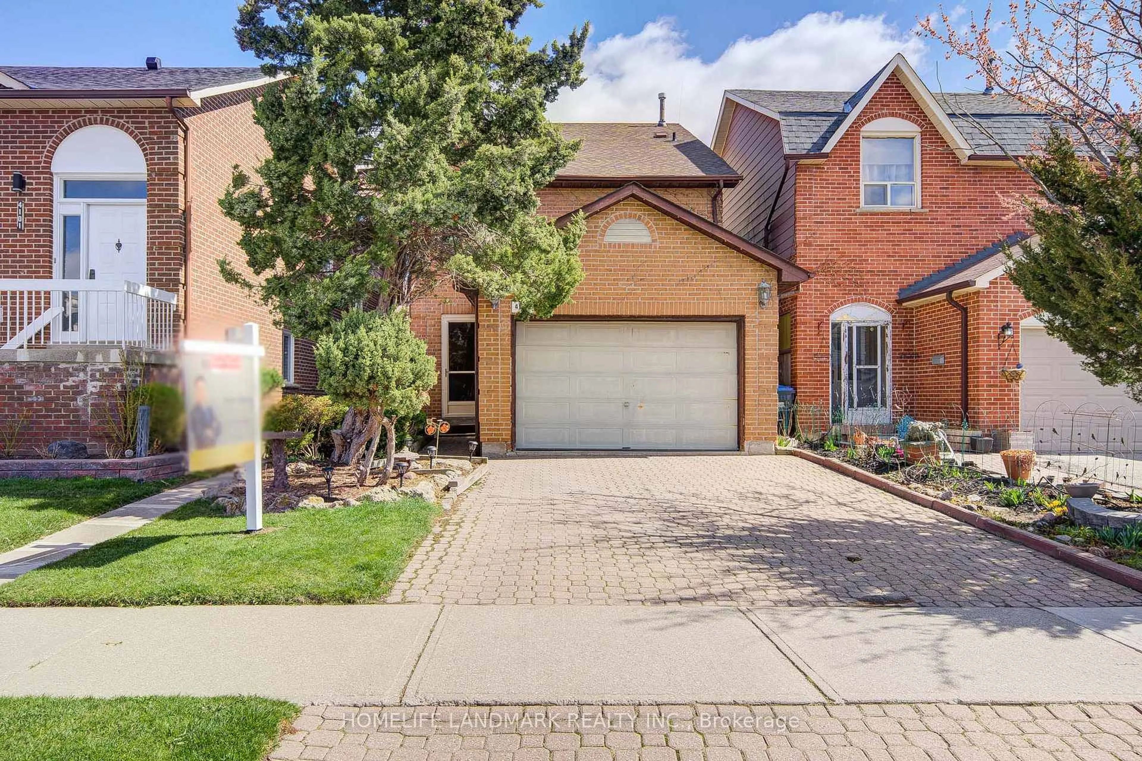Home with brick exterior material, street for 4097 Quaker Hill Dr, Mississauga Ontario L5C 3M2