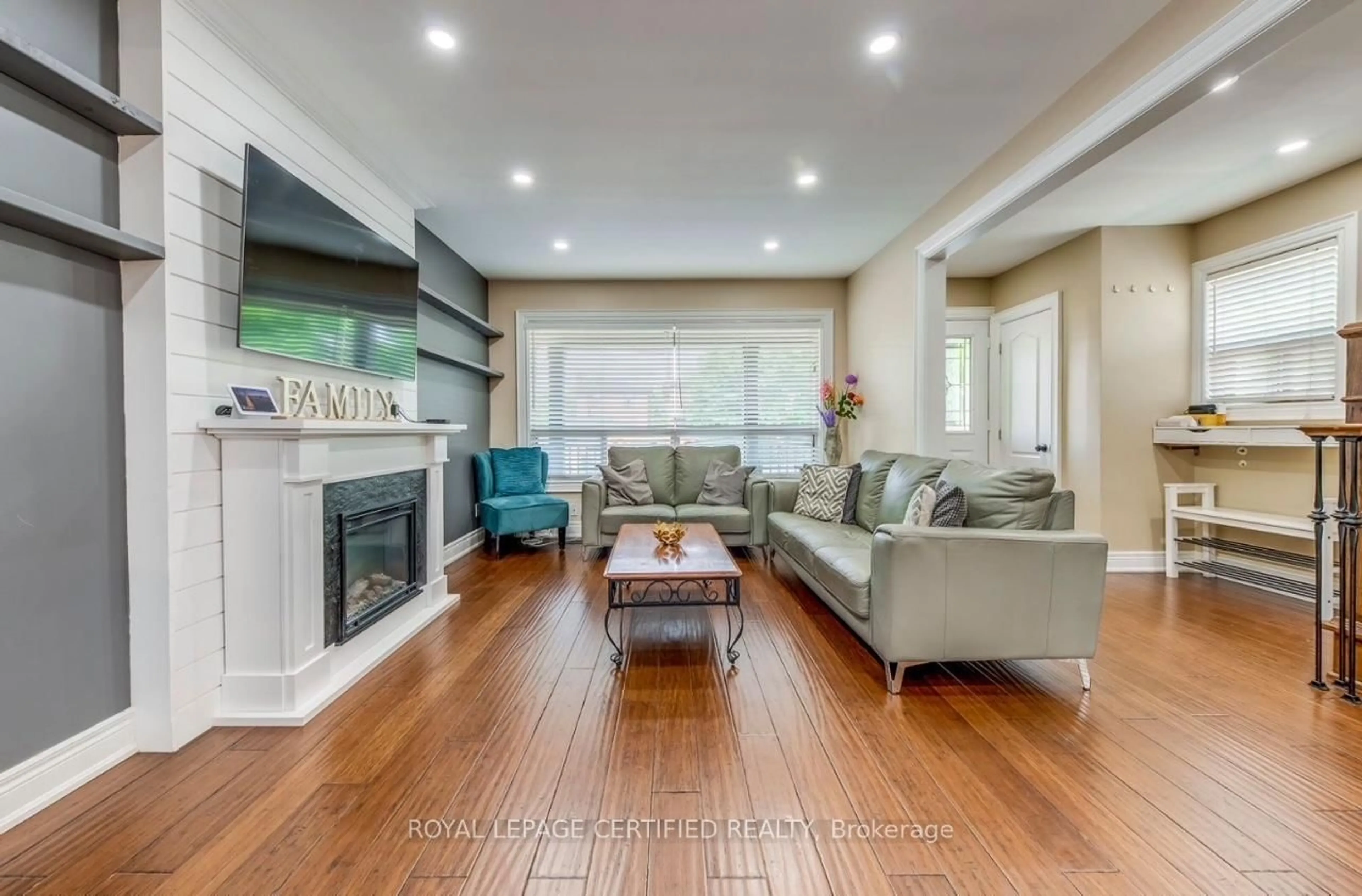 Living room with furniture, wood/laminate floor for 5 Hilldale Rd, Toronto Ontario M6N 3Y1