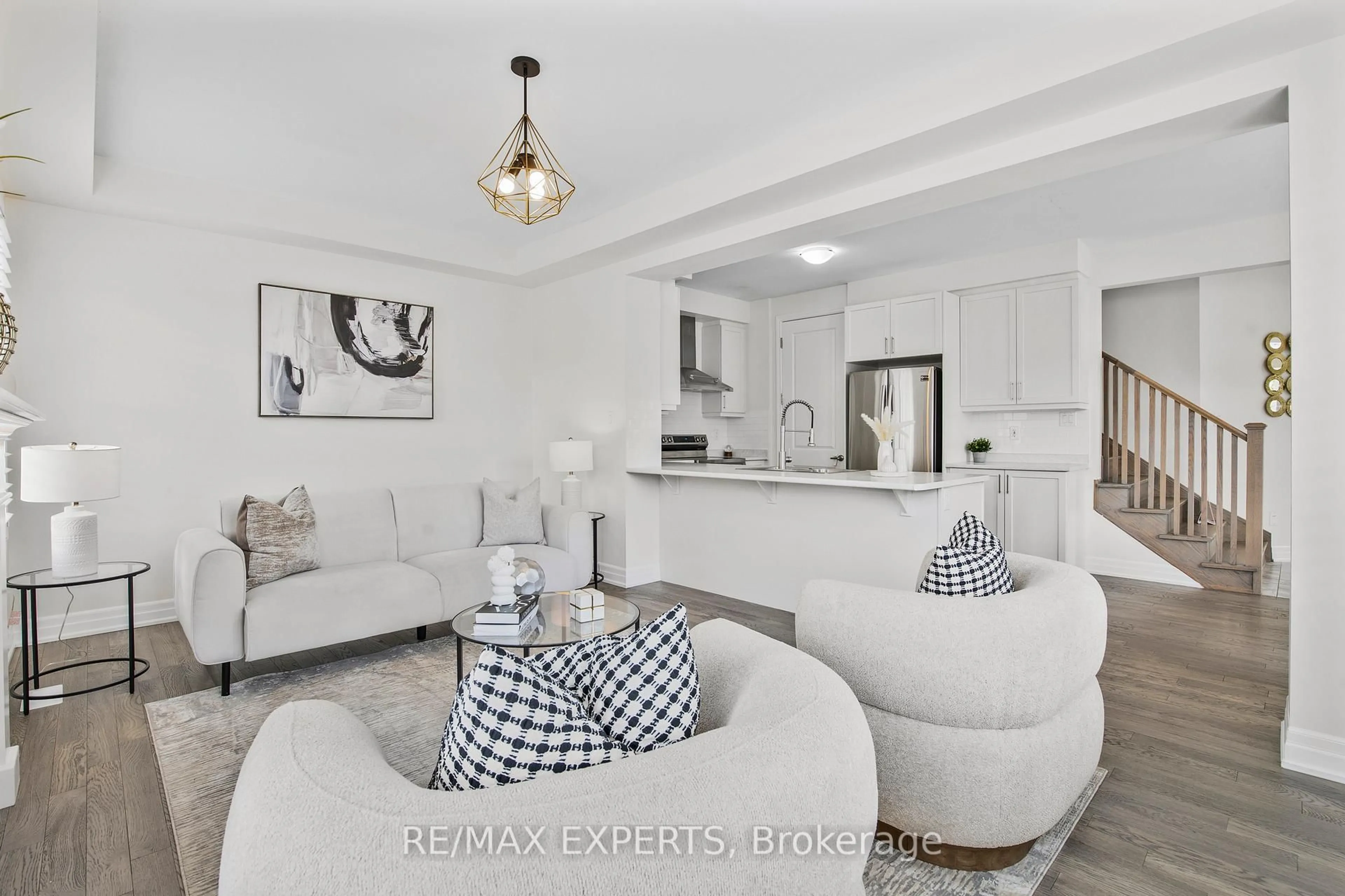 Living room with furniture, ceramic/tile floor for 1374 Rose Way, Milton Ontario L9E 1M7