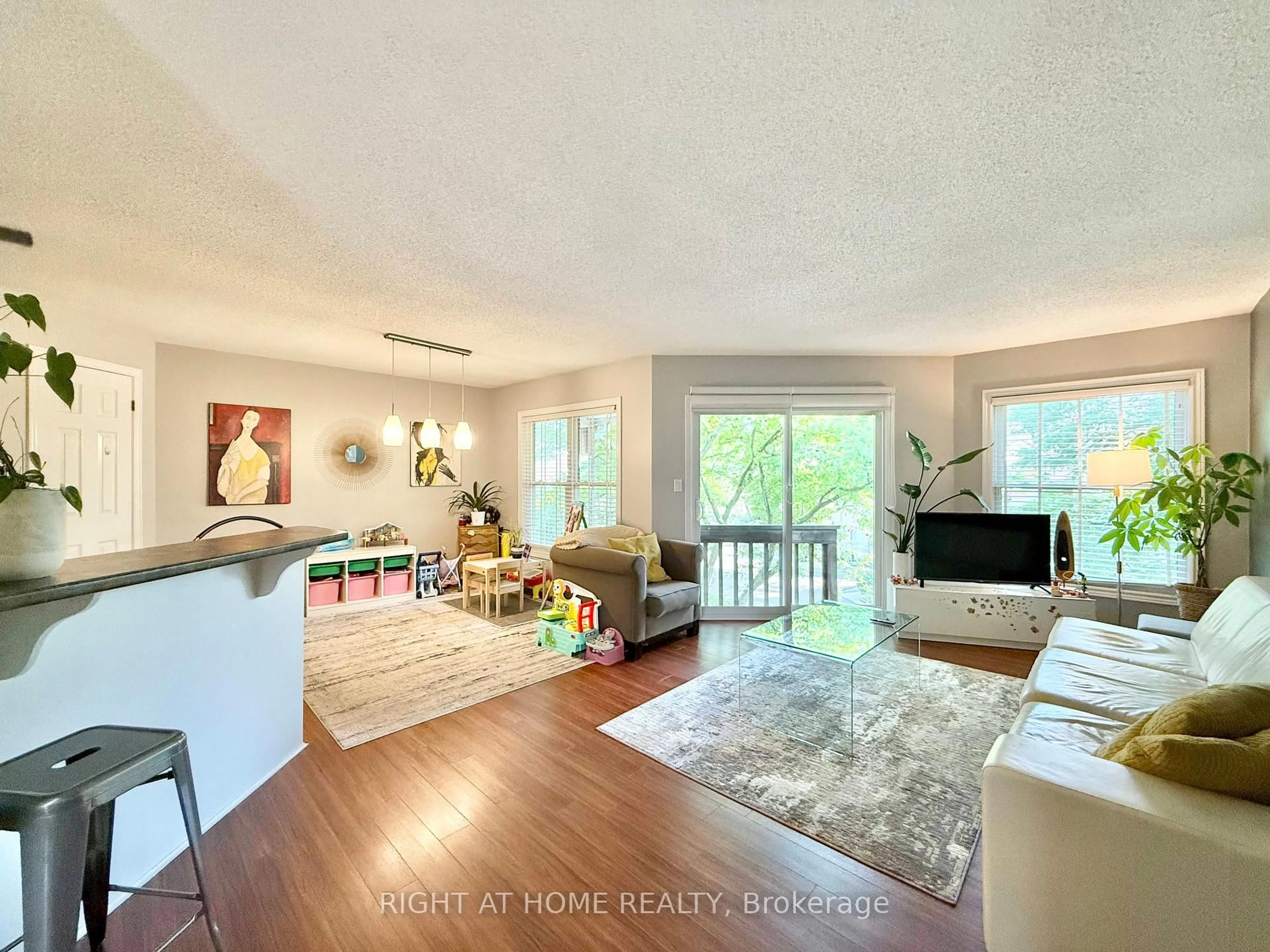 Living room with furniture, unknown for 1220 Thorpe Rd #214, Burlington Ontario L7S 2H5