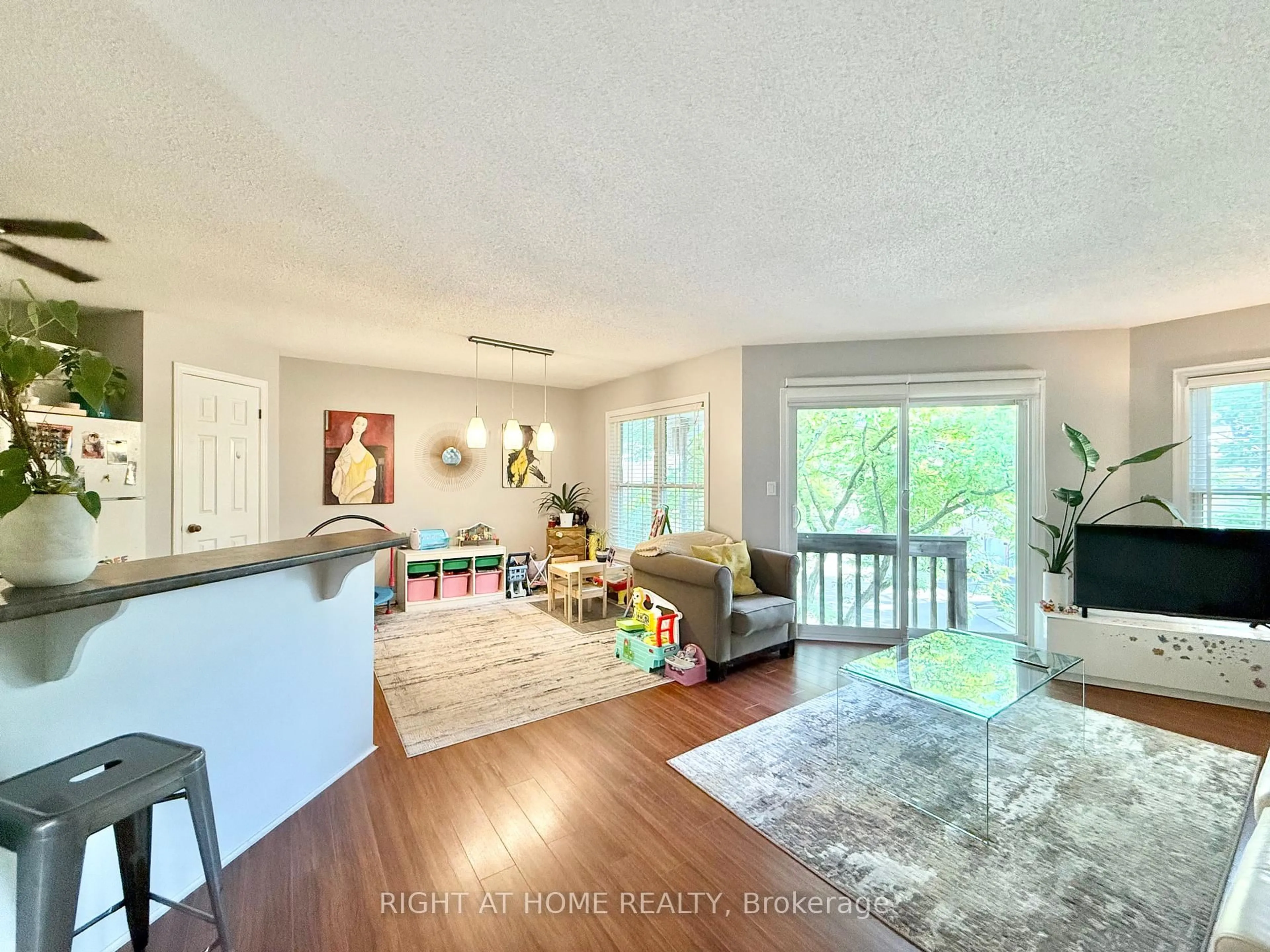 Living room with furniture, unknown for 1220 Thorpe Rd #214, Burlington Ontario L7S 2H5