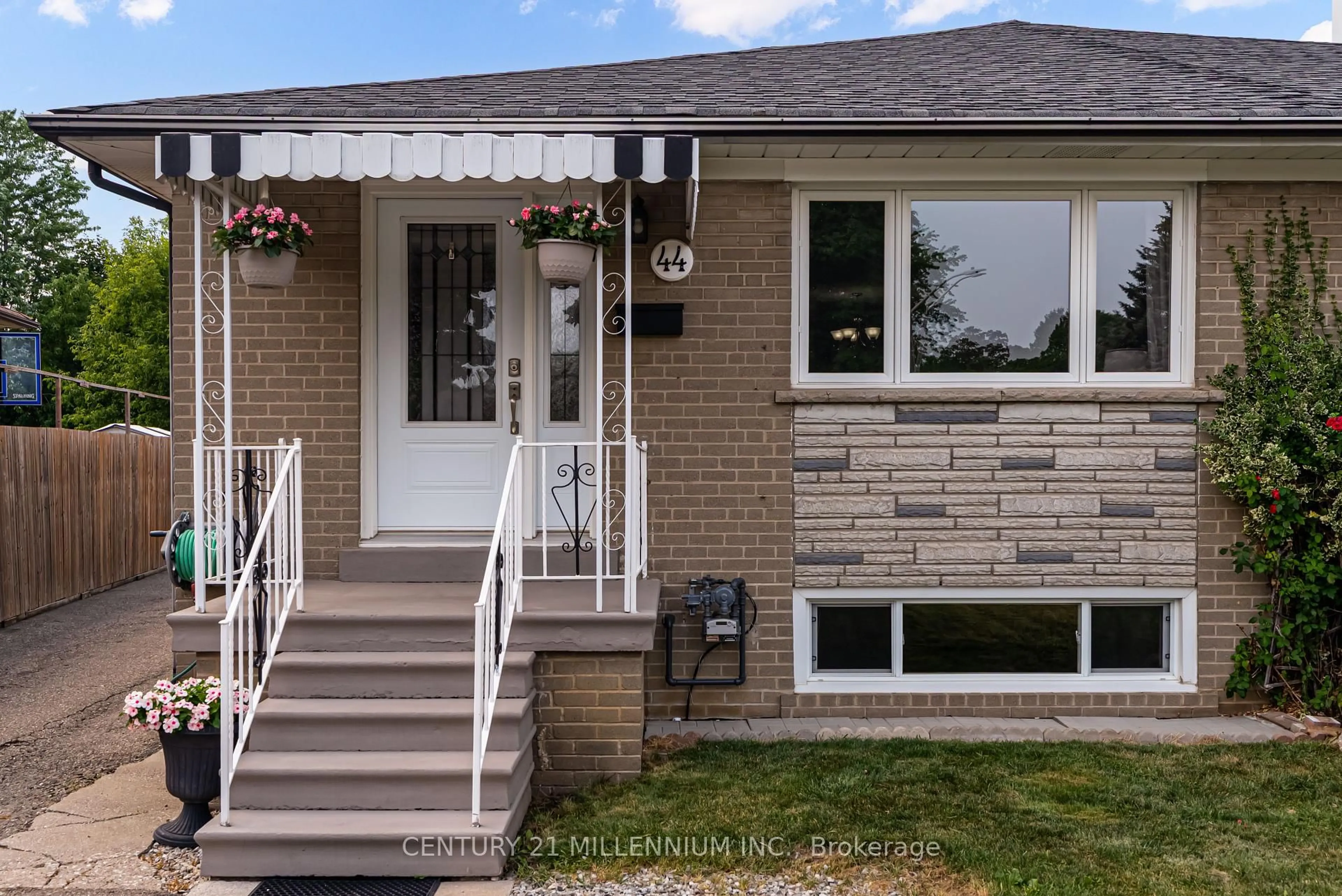 Home with vinyl exterior material, street for 44 Sanford Cres, Brampton Ontario L6X 2C3