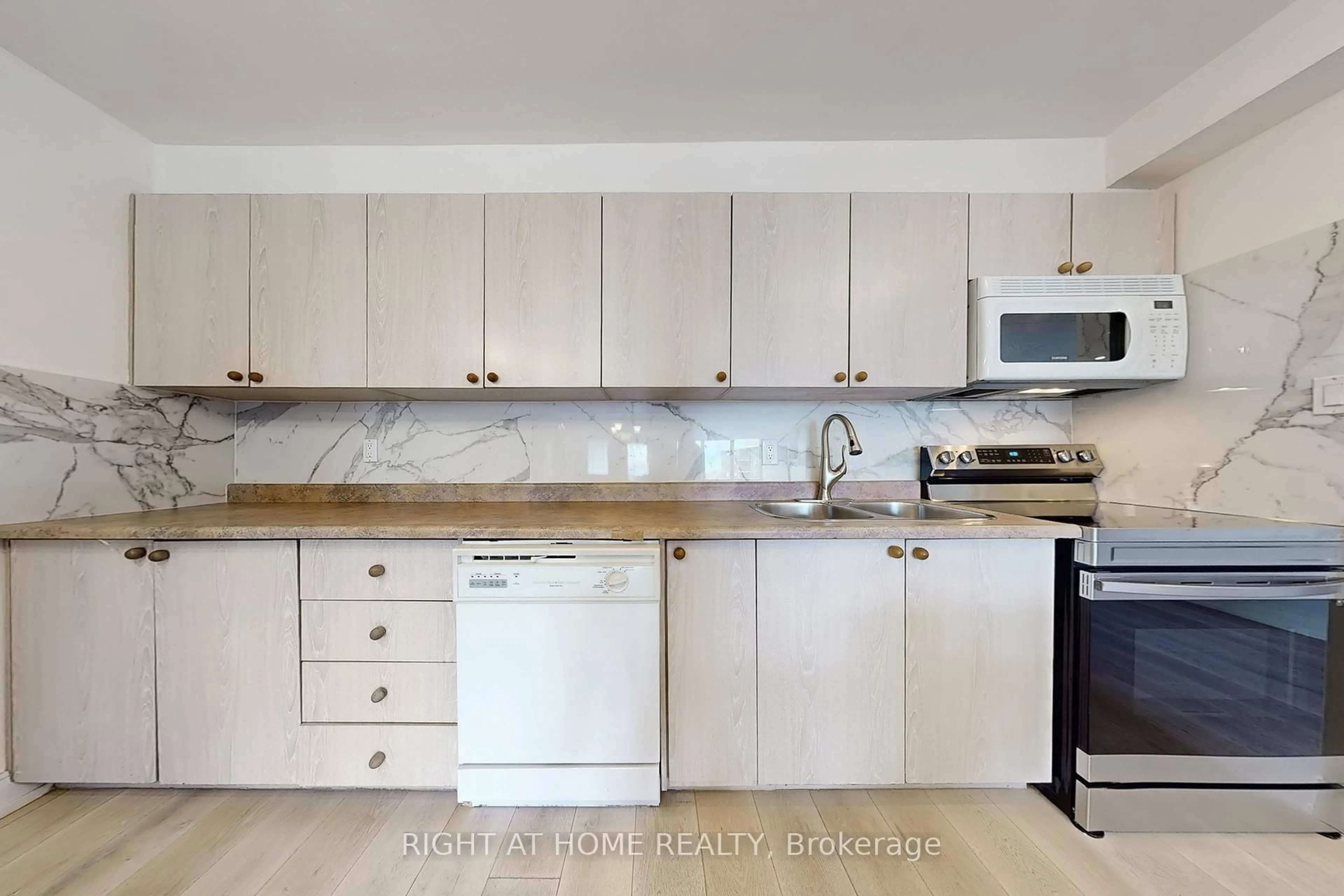 Standard kitchen, wood/laminate floor for 714 The West Mall Rd #1703, Toronto Ontario M9C 4X1