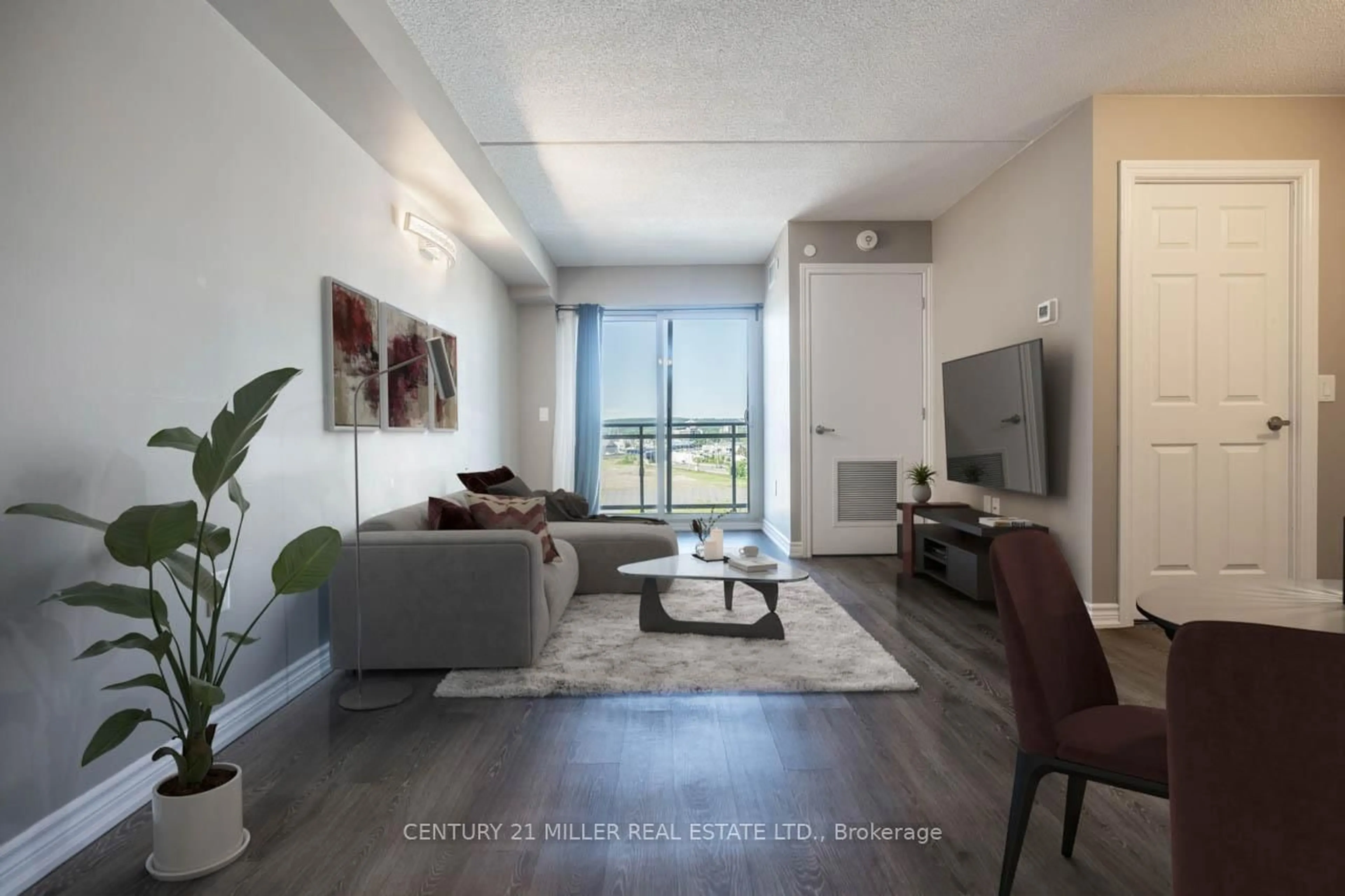 Living room with furniture, unknown for 716 Main St #509, Milton Ontario L9T 9L9