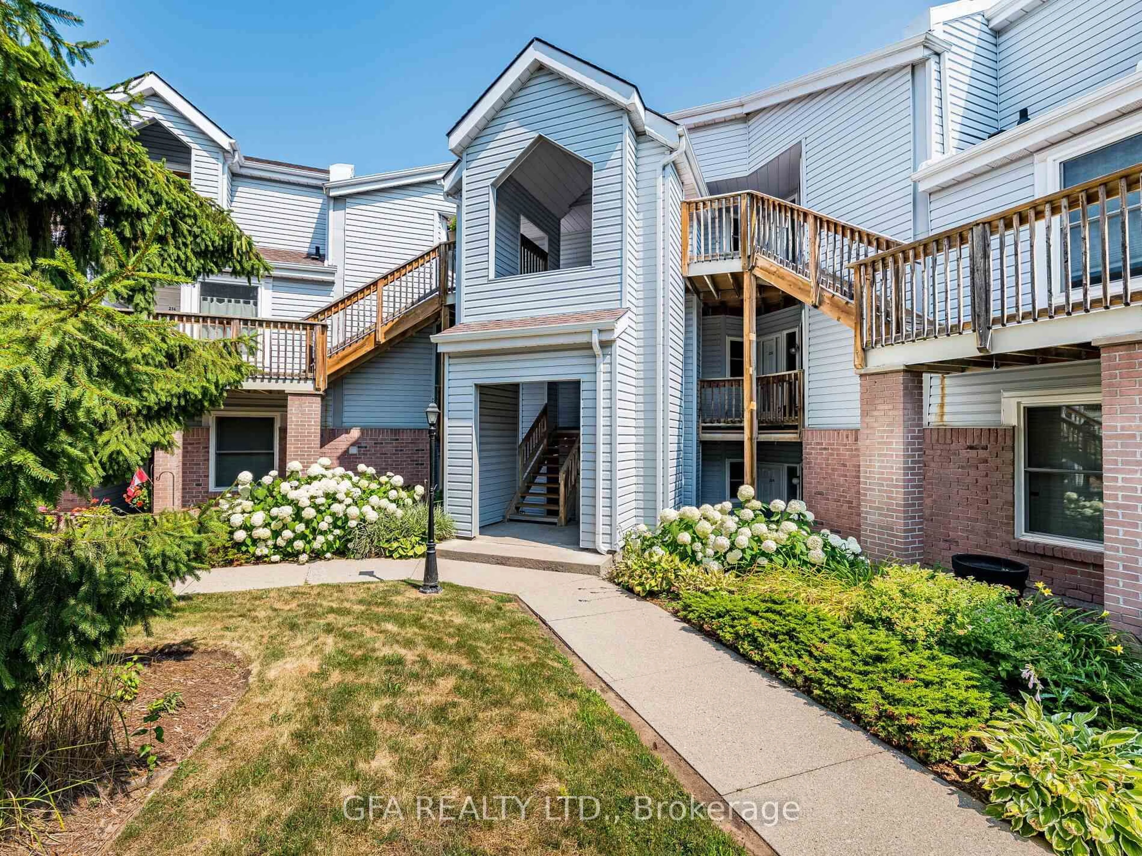 A pic from outside/outdoor area/front of a property/back of a property/a pic from drone, street for 1220 Thorpe Rd #210, Burlington Ontario L7S 2H5