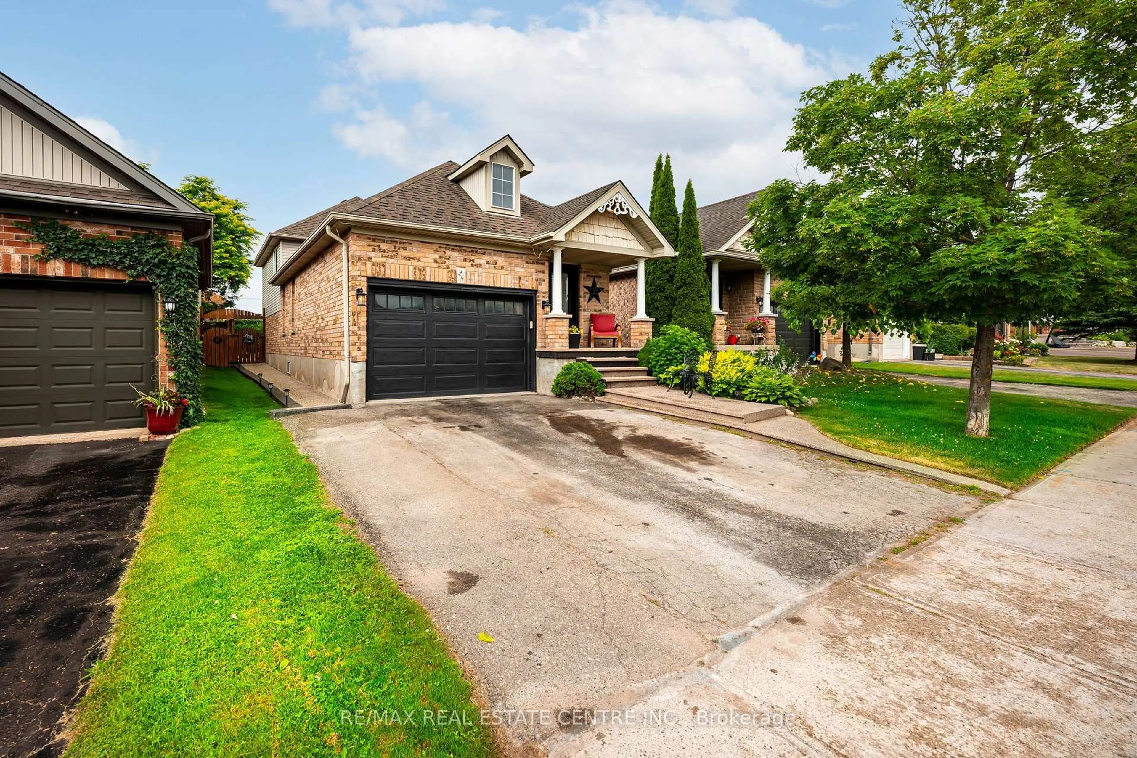 Home with brick exterior material, street for 28 Henderson St, Orangeville Ontario L9W 5G1