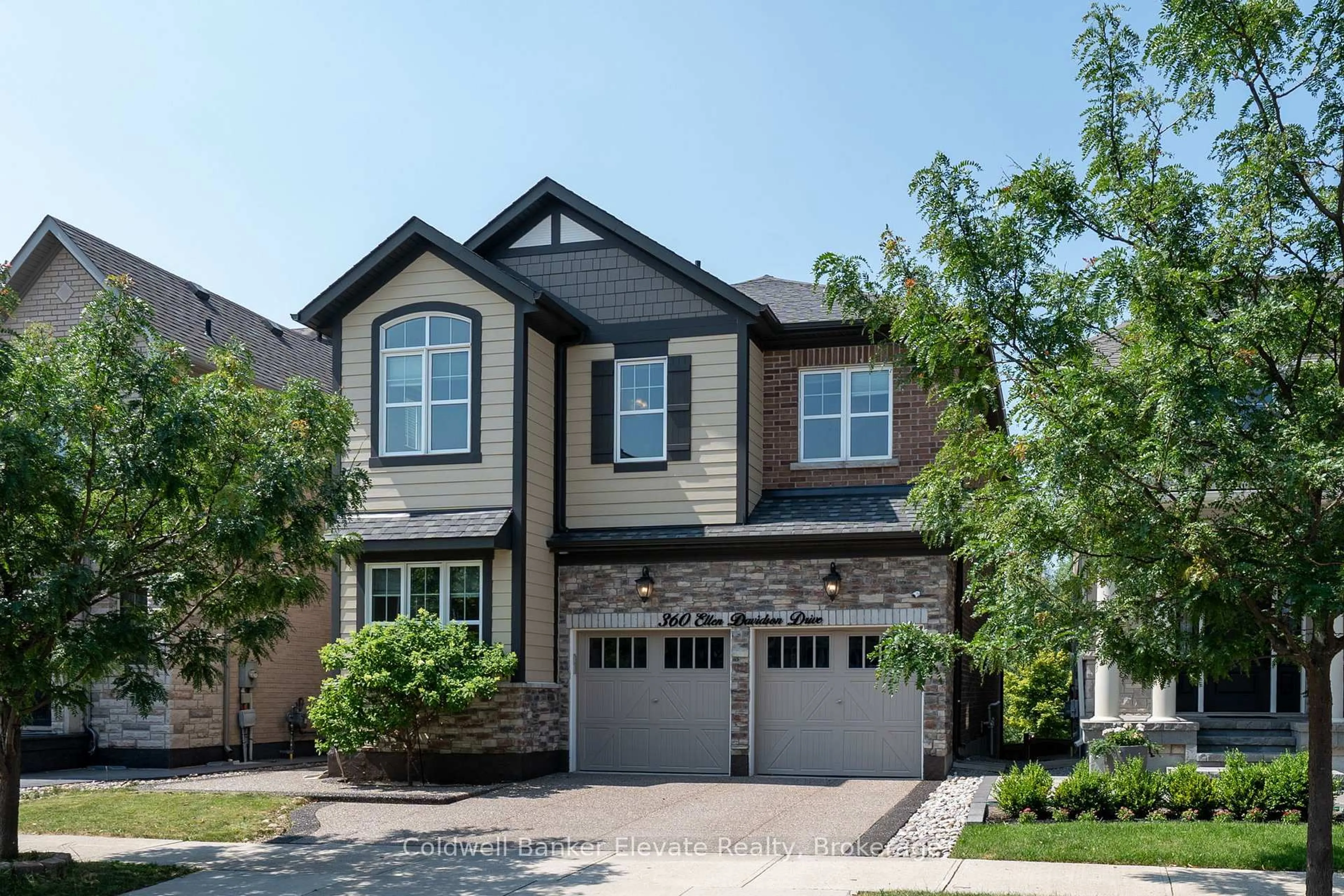 Home with brick exterior material, street for 360 Ellen Davidson Dr, Oakville Ontario L6M 0V7