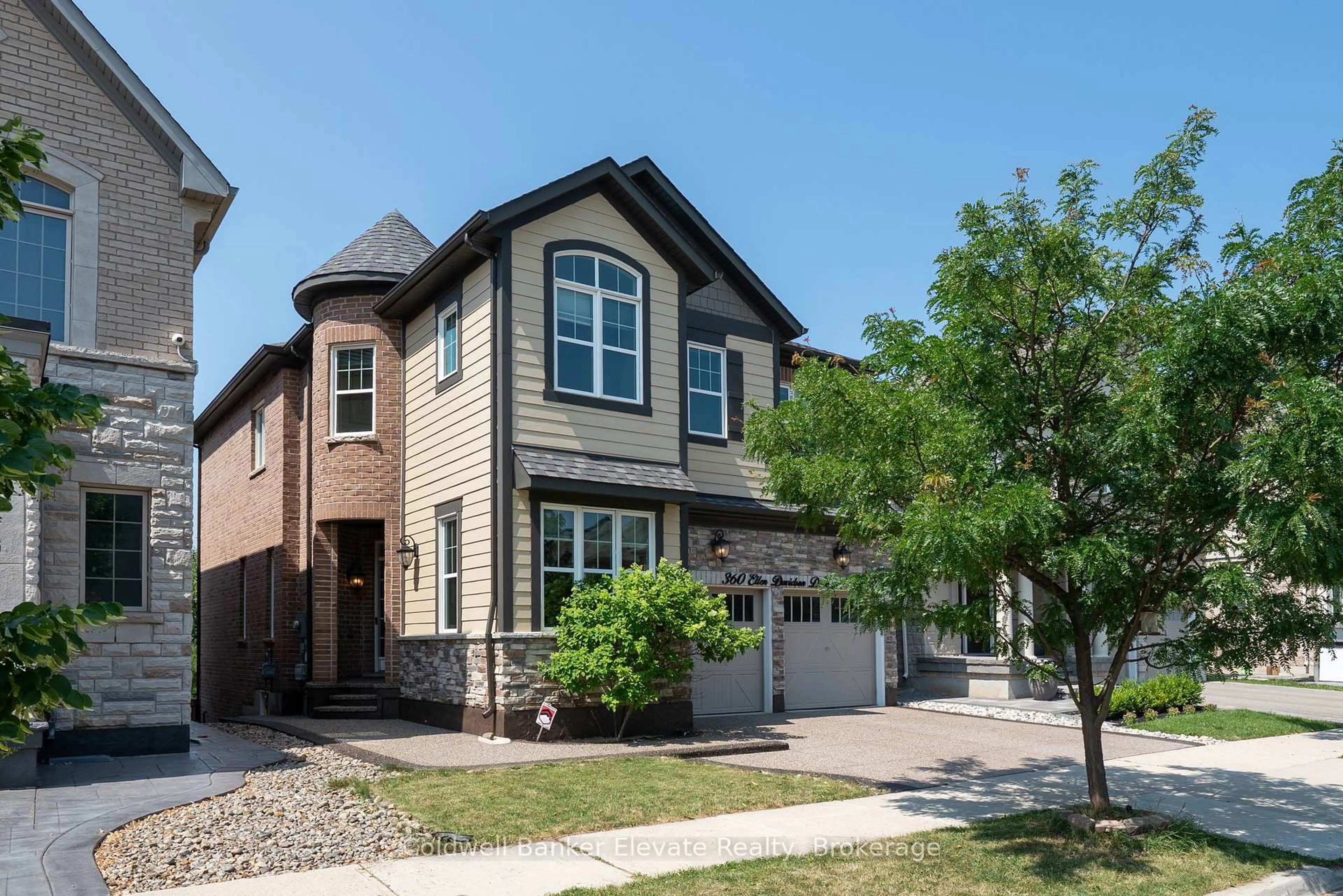 Home with brick exterior material, street for 360 Ellen Davidson Dr, Oakville Ontario L6M 0V7