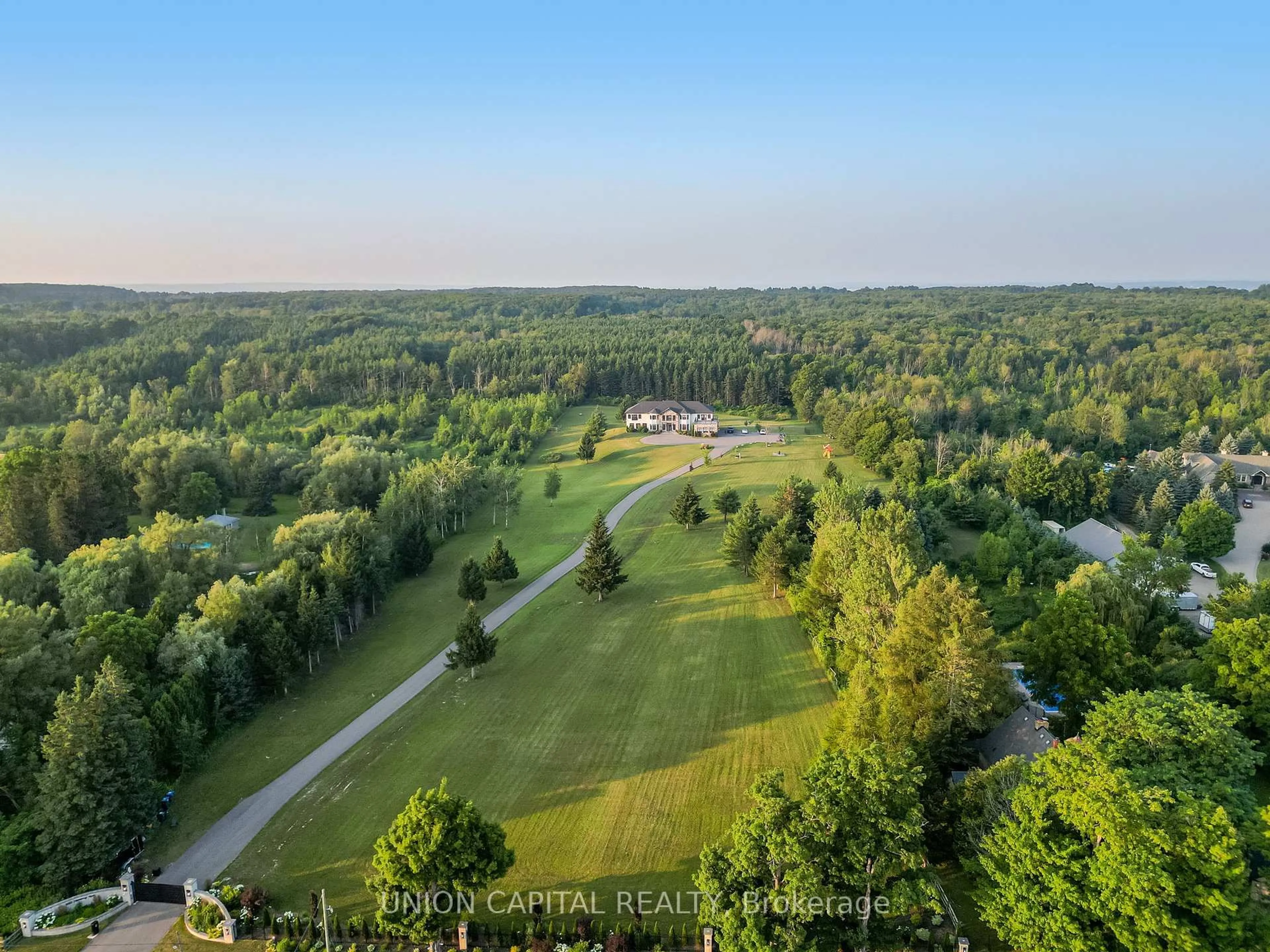 A pic from outside/outdoor area/front of a property/back of a property/a pic from drone, forest/trees view for 16033 Mississauga Rd, Caledon Ontario L7C 1X8