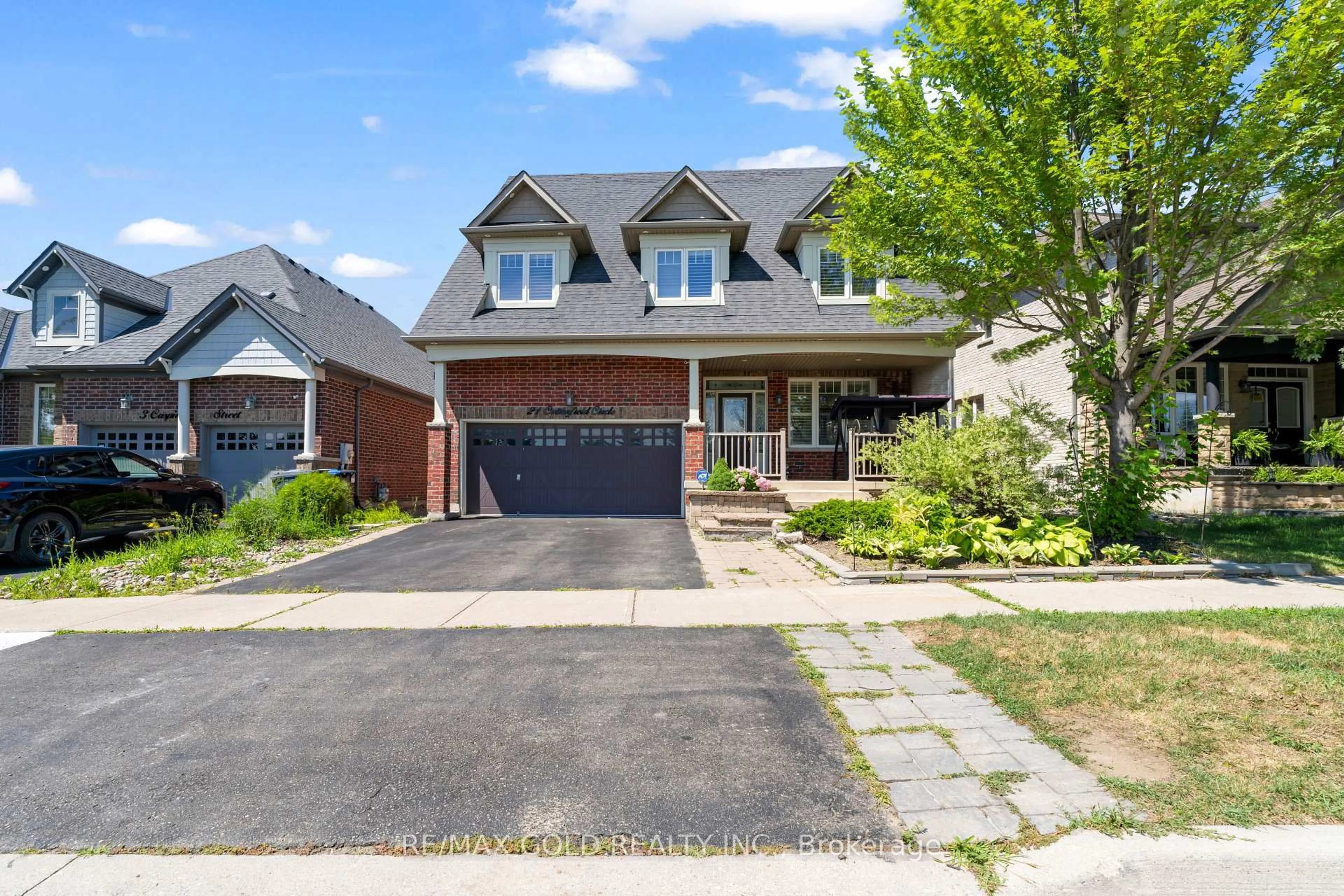 Home with brick exterior material, street for 21 Cottonfield Circ, Caledon Ontario L7C 3M8