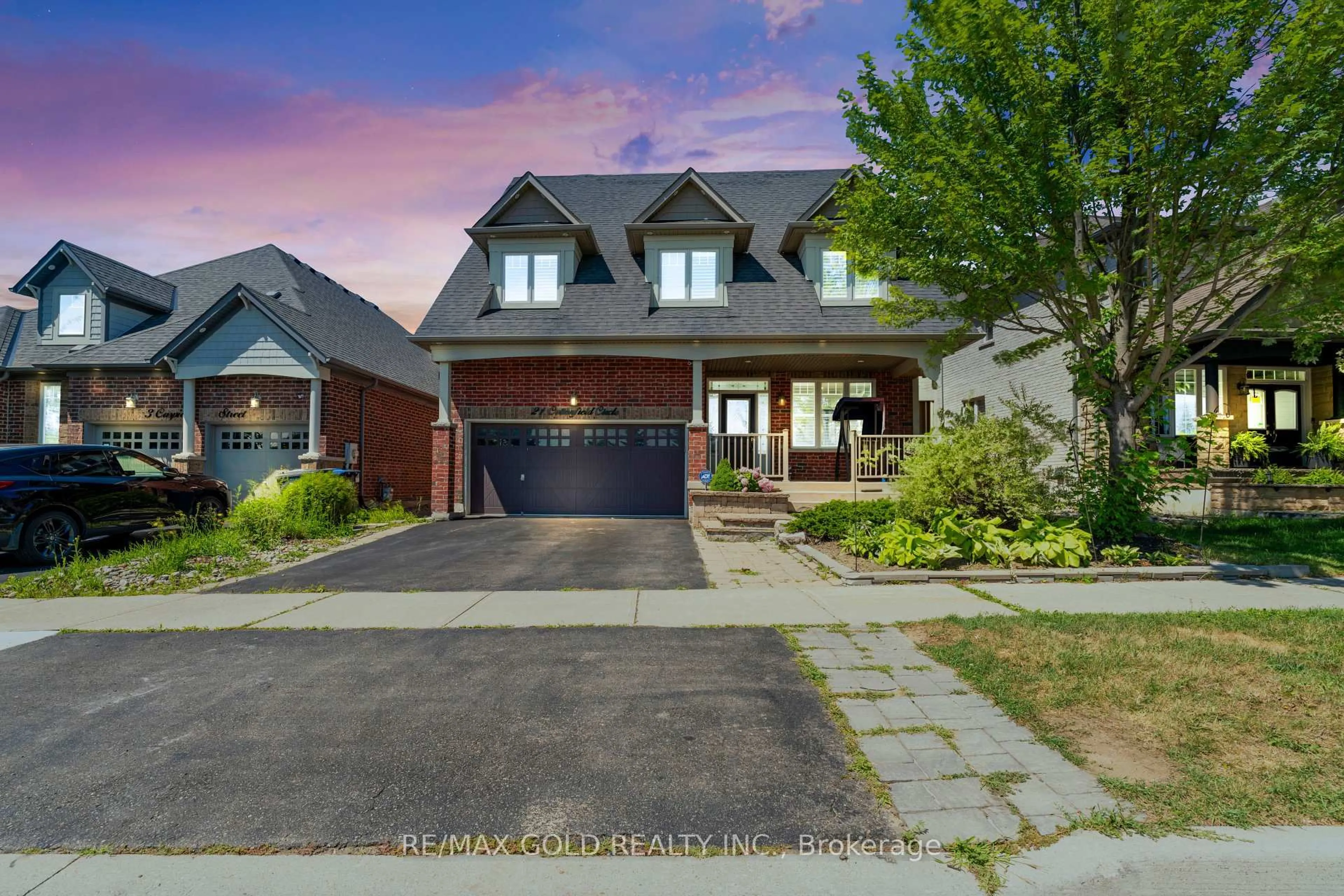 Home with brick exterior material, street for 21 Cottonfield Circ, Caledon Ontario L7C 3M8
