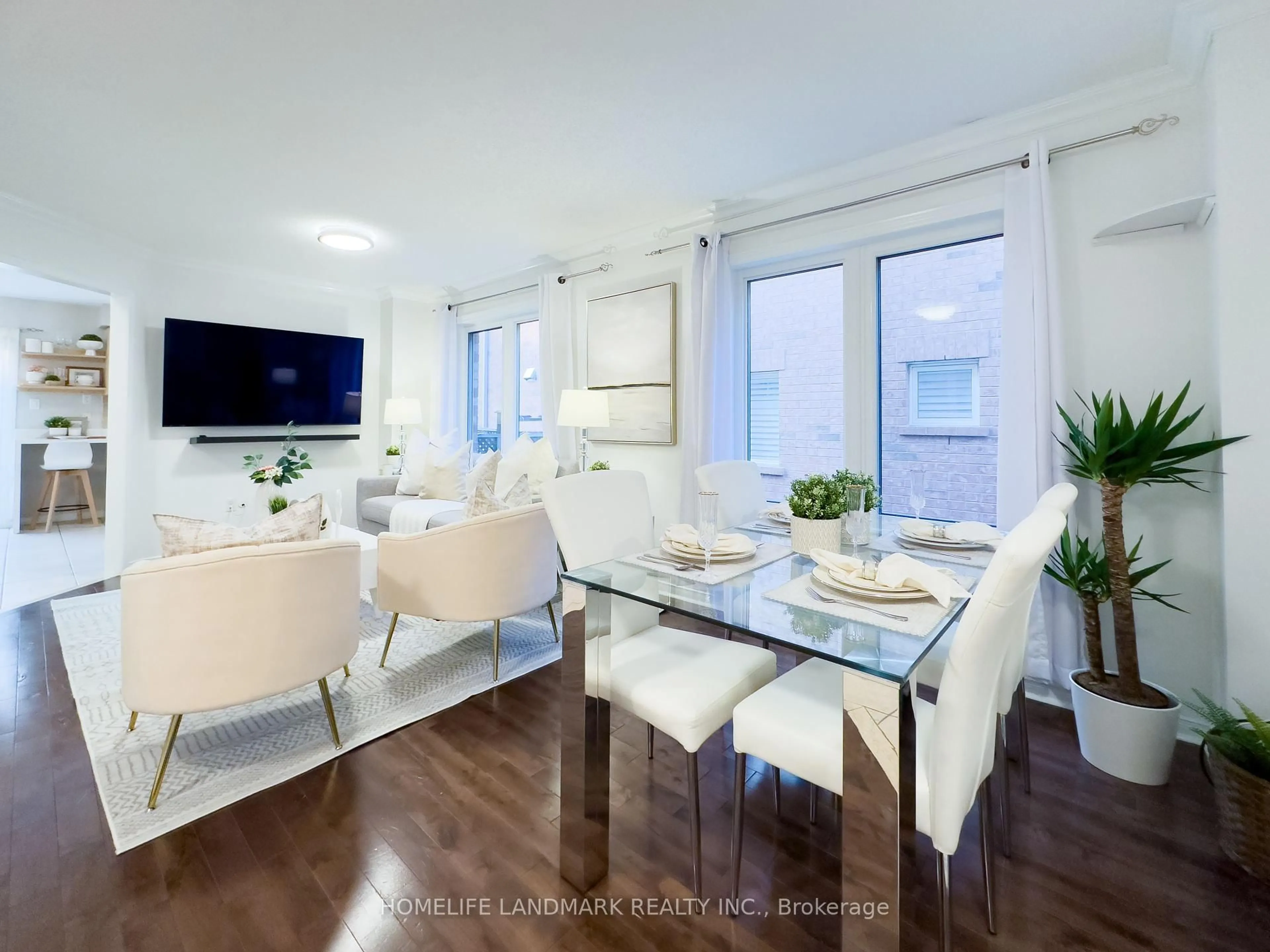 Living room with furniture, wood/laminate floor for 3153 Baron Dr, Mississauga Ontario L5M 6V6
