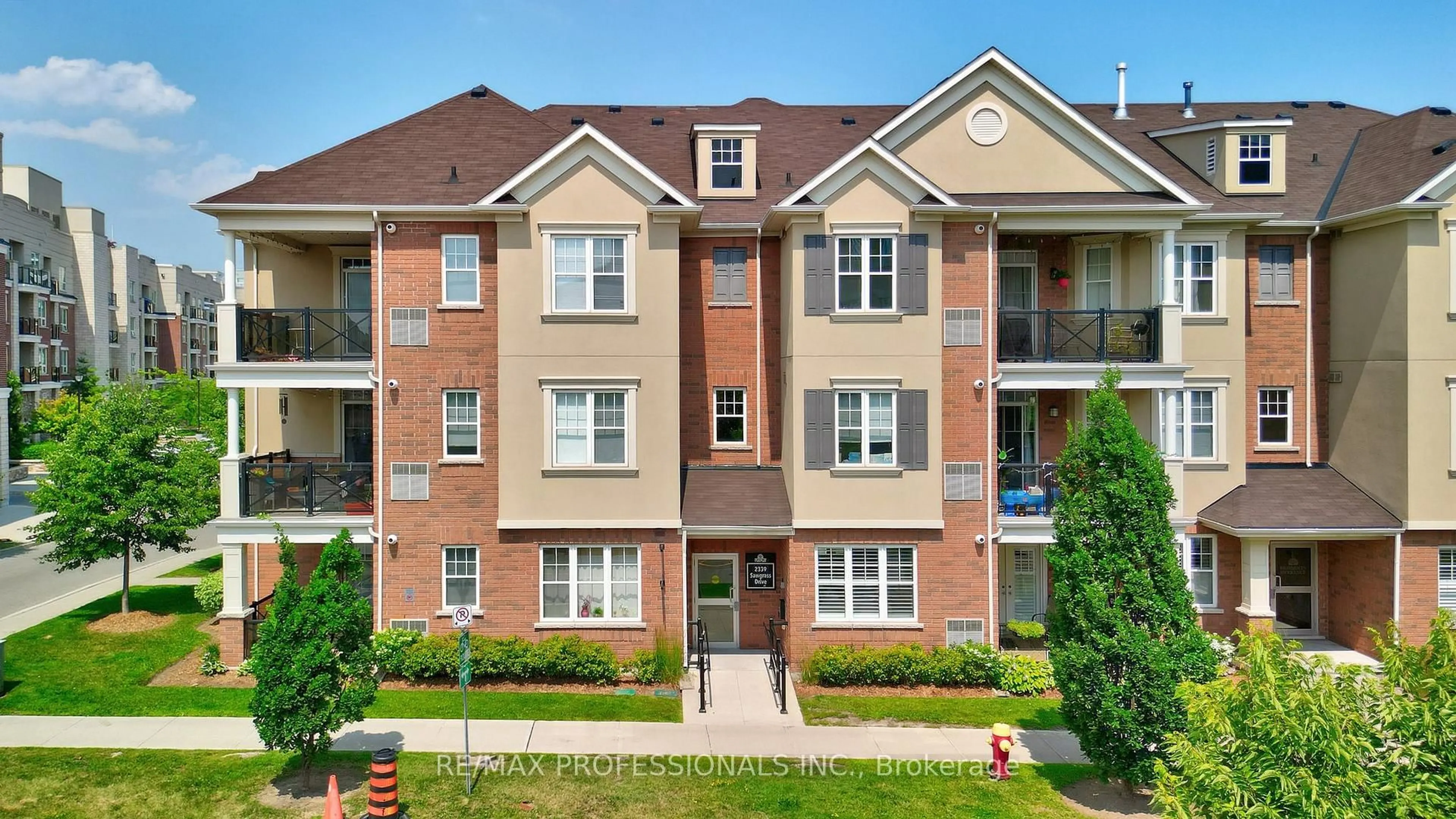 Home with brick exterior material, unknown for 2339 Sawgrass Dr #301, Oakville Ontario L6H 0L1