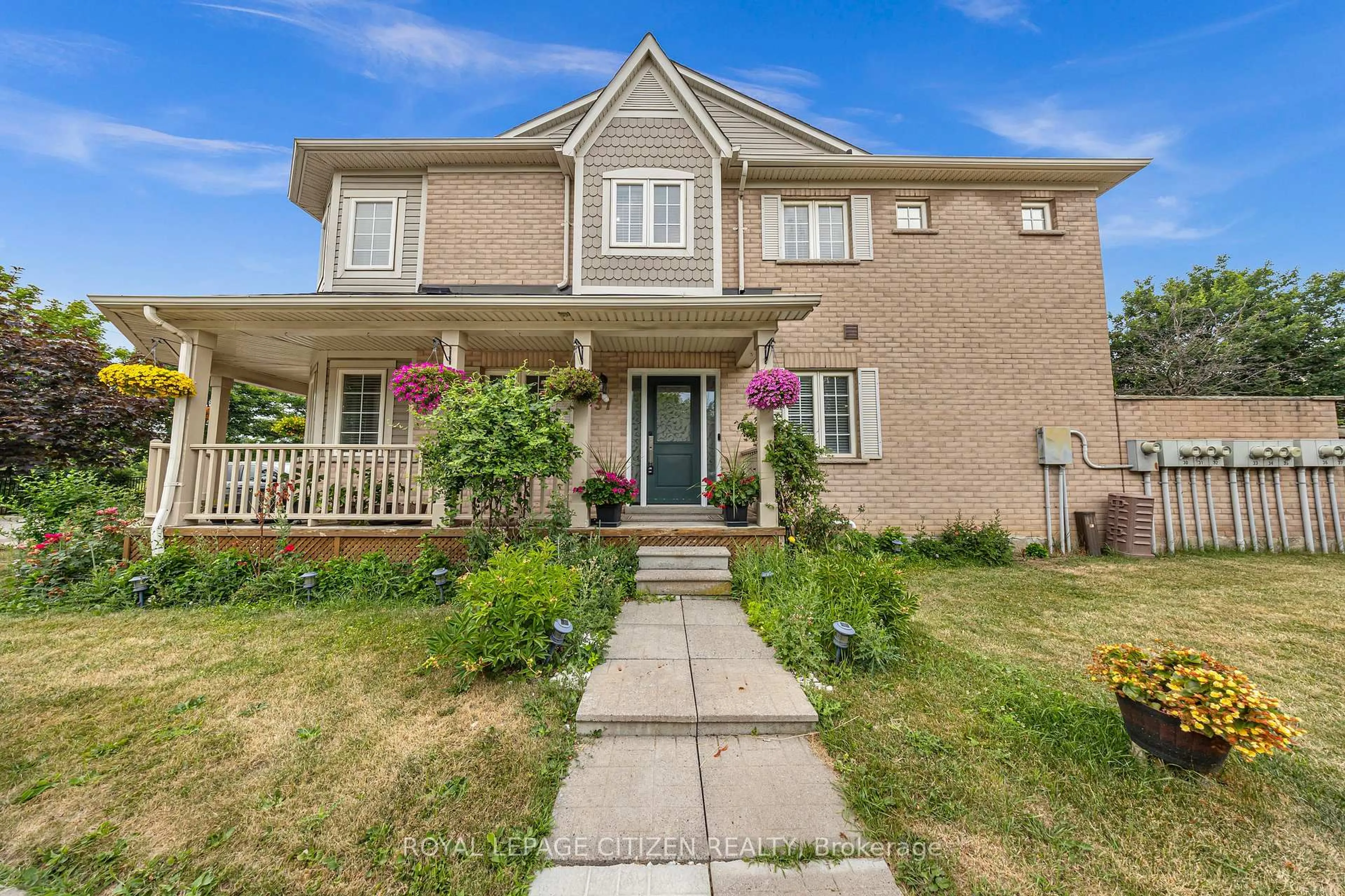 Home with brick exterior material, street for 7190 Atwood Lane #37, Mississauga Ontario L5N 7Y6