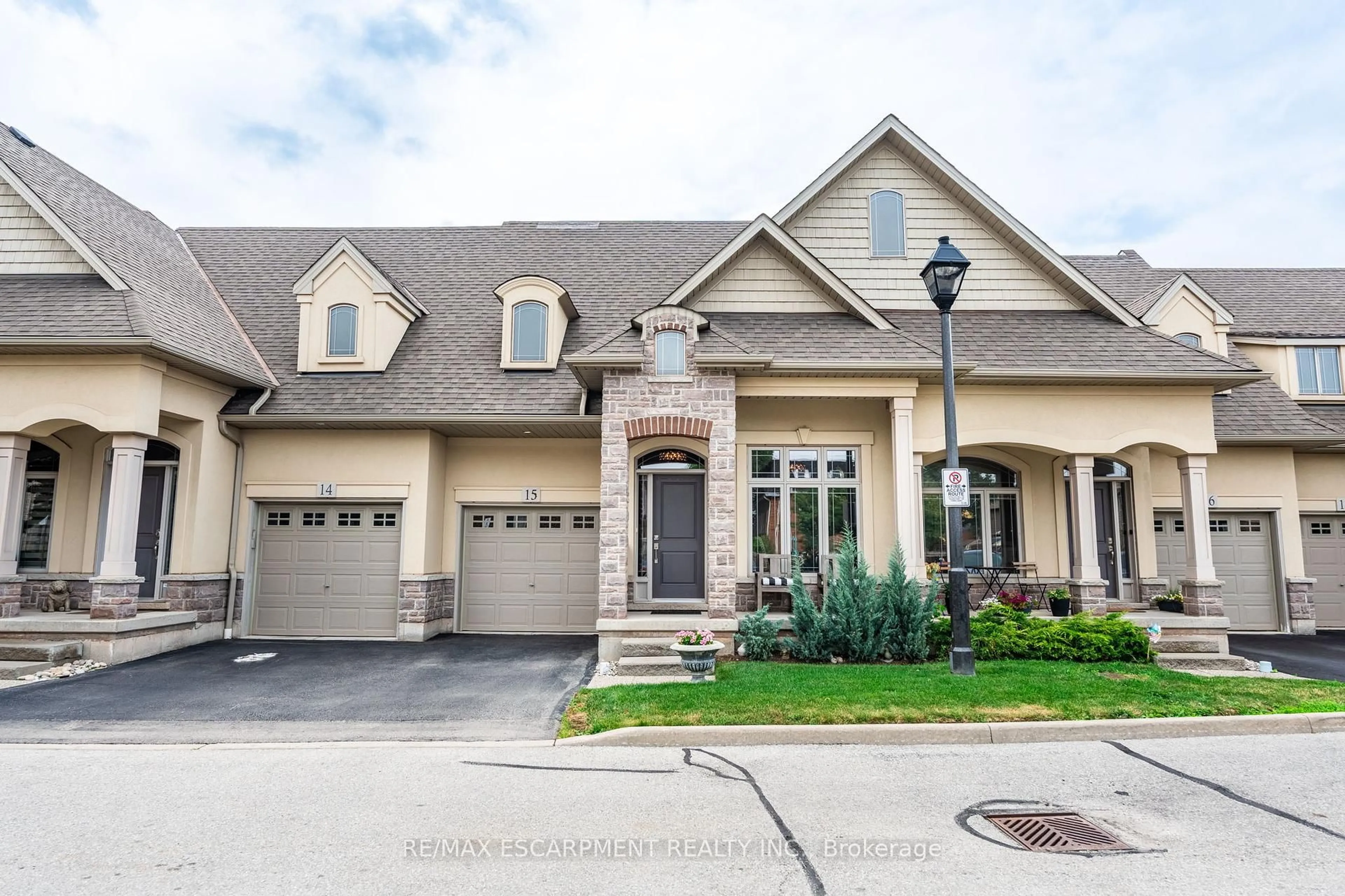 Home with brick exterior material, street for 5056 New St #15, Burlington Ontario L7L 1V1