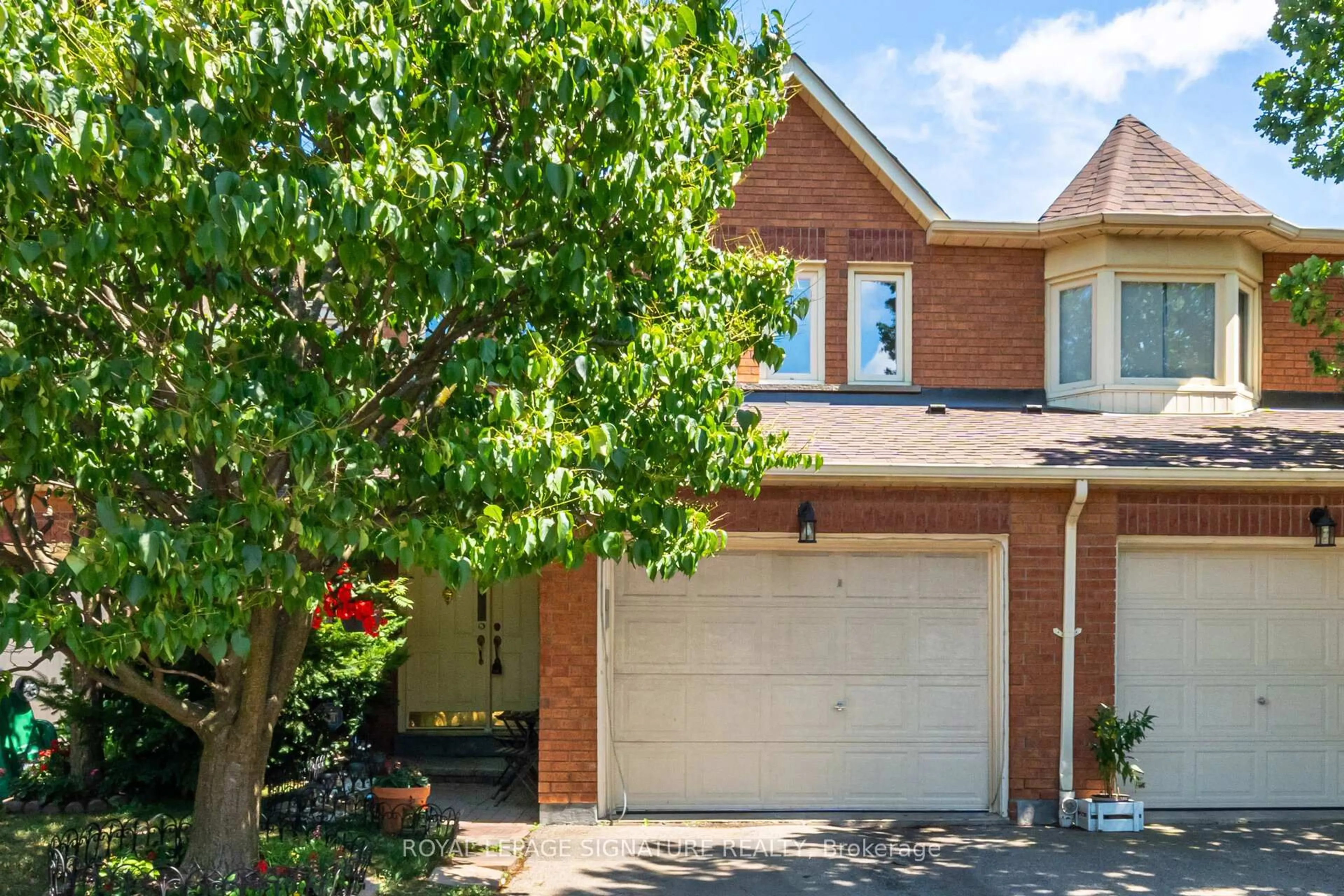 Home with brick exterior material, street for 800 Constellation Dr #23, Mississauga Ontario L5R 3L6