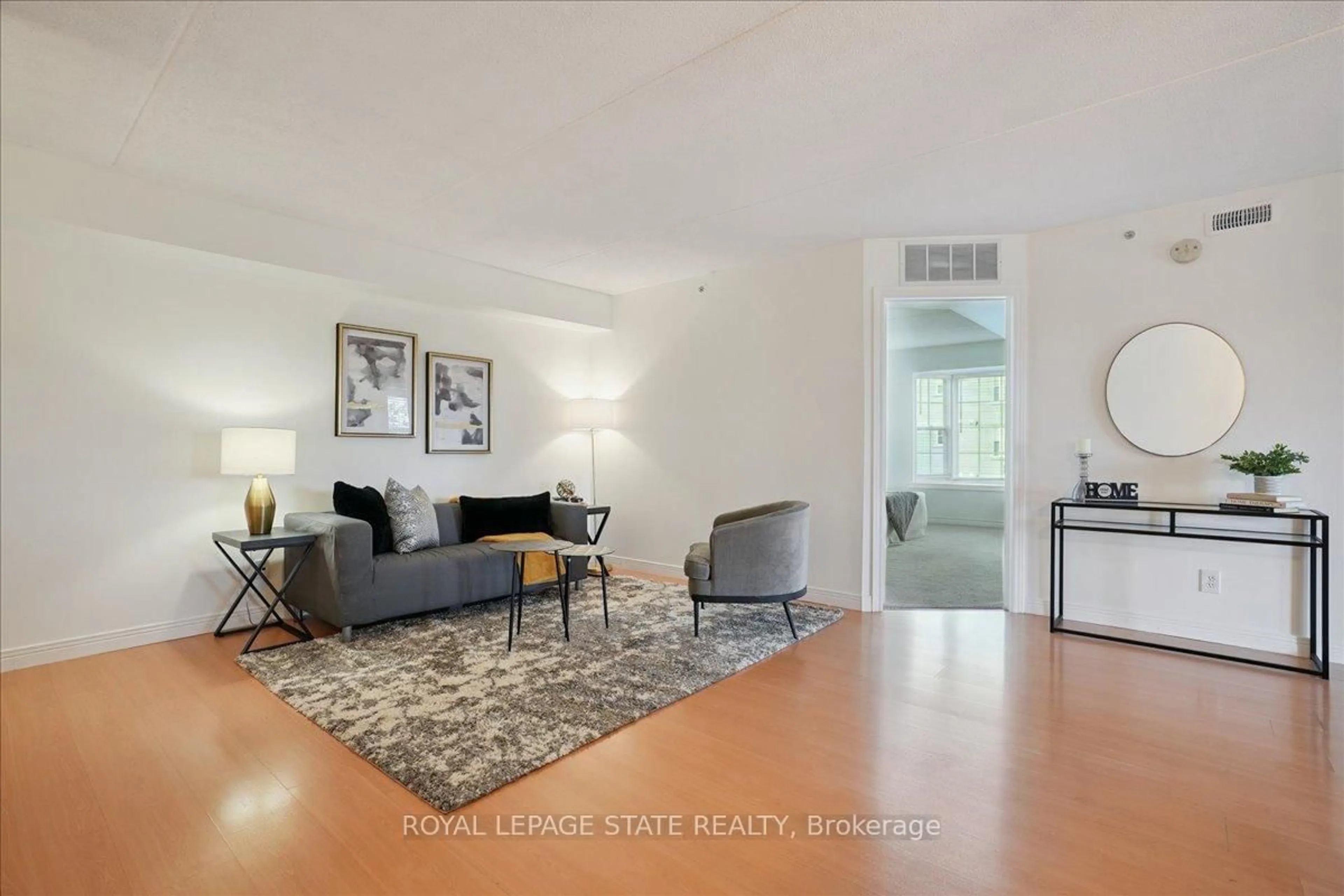 Living room with furniture, unknown for 1411 Walker's Line #301, Burlington Ontario L7M 4P5