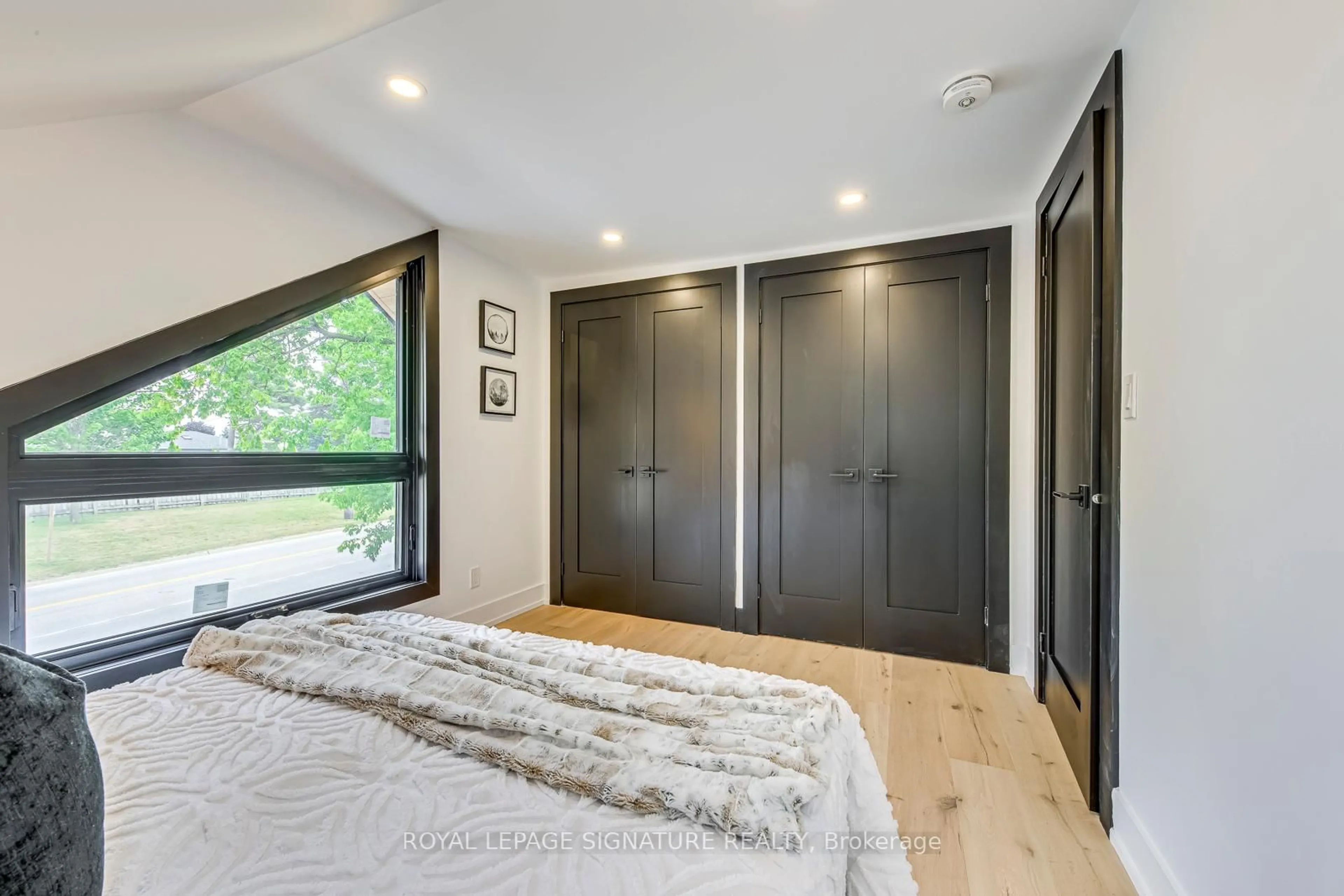 Bedroom with bed, wood/laminate floor for 11024 Trafalgar Rd, Halton Hills Ontario L7G 4S5