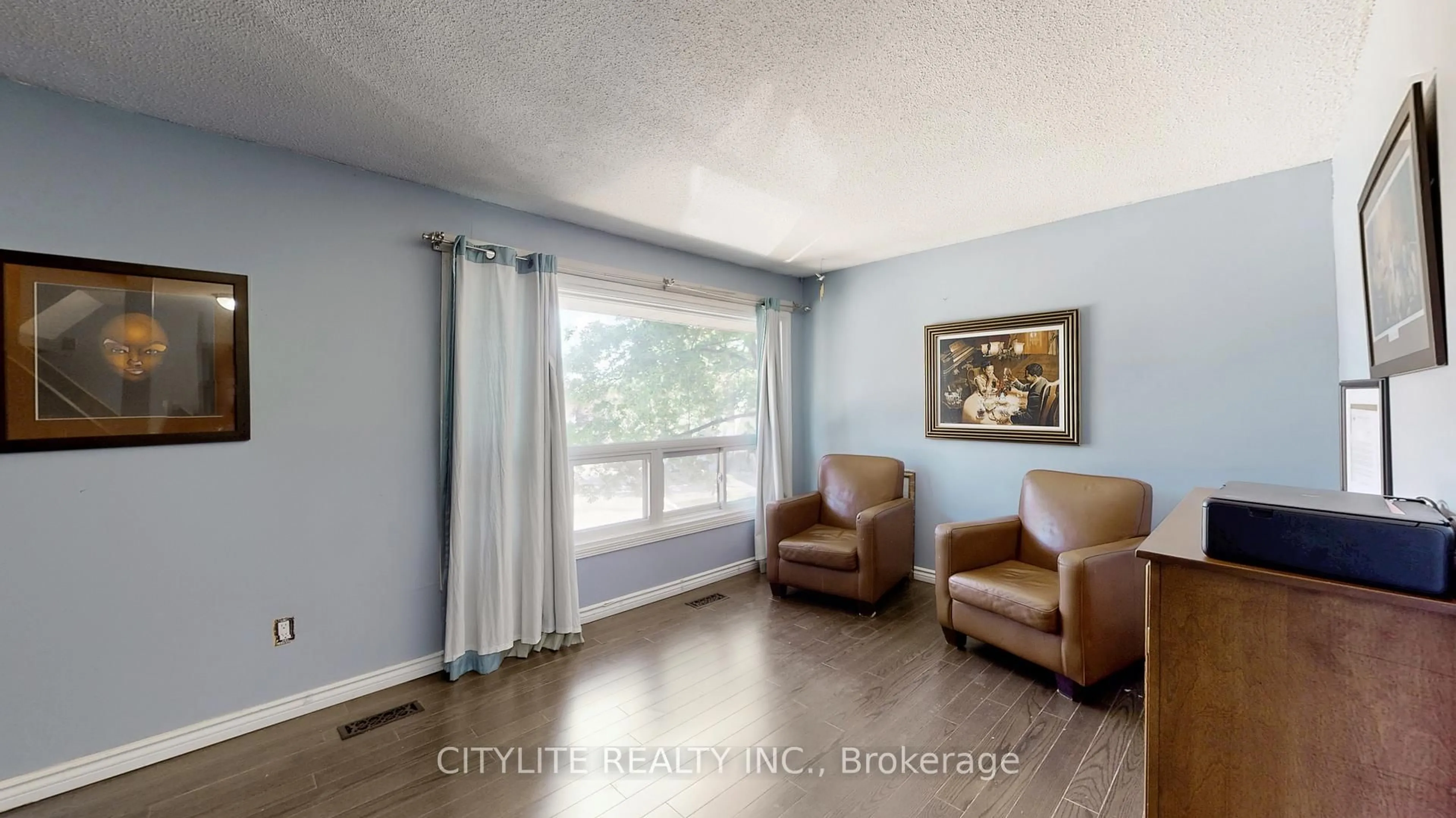 Living room with furniture, wood/laminate floor for 46 Ashton Cres #46, Brampton Ontario L6S 3J9