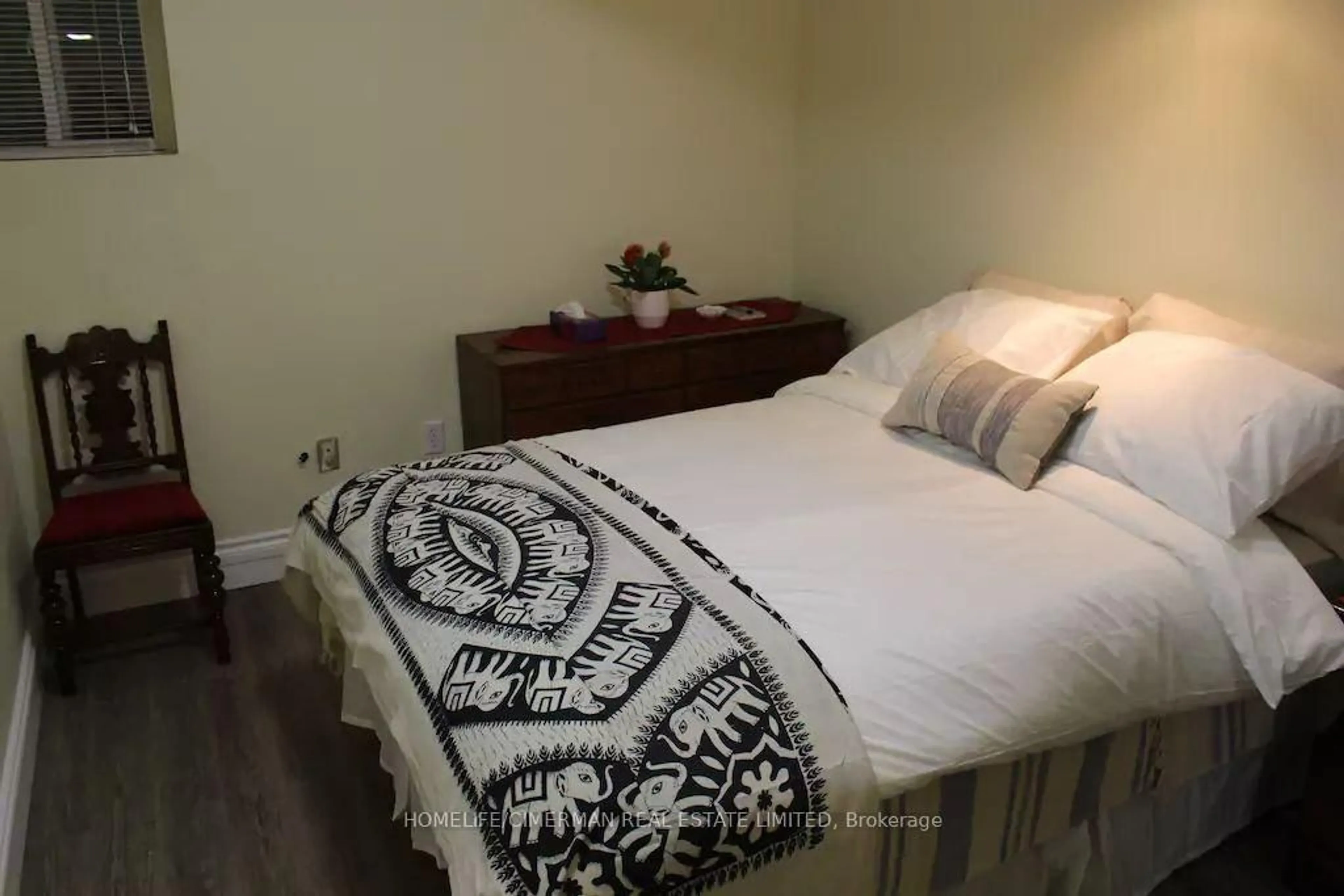 Bedroom with bed, wood/laminate floor for 313 Murray Ross Pkwy, Toronto Ontario M3J 3N8
