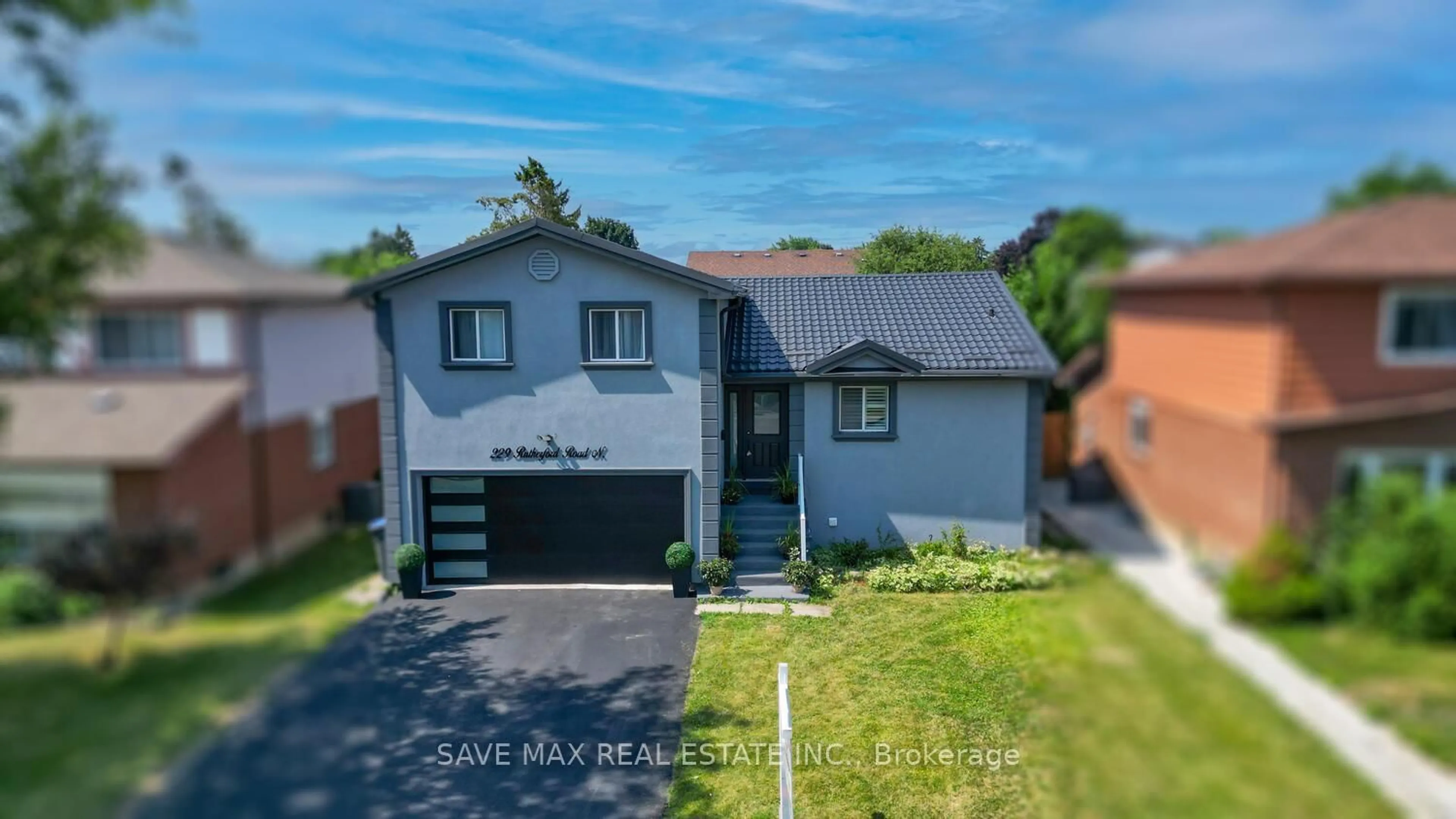 A pic from outside/outdoor area/front of a property/back of a property/a pic from drone, street for 229 Rutherford Rd, Brampton Ontario L6V 2X7