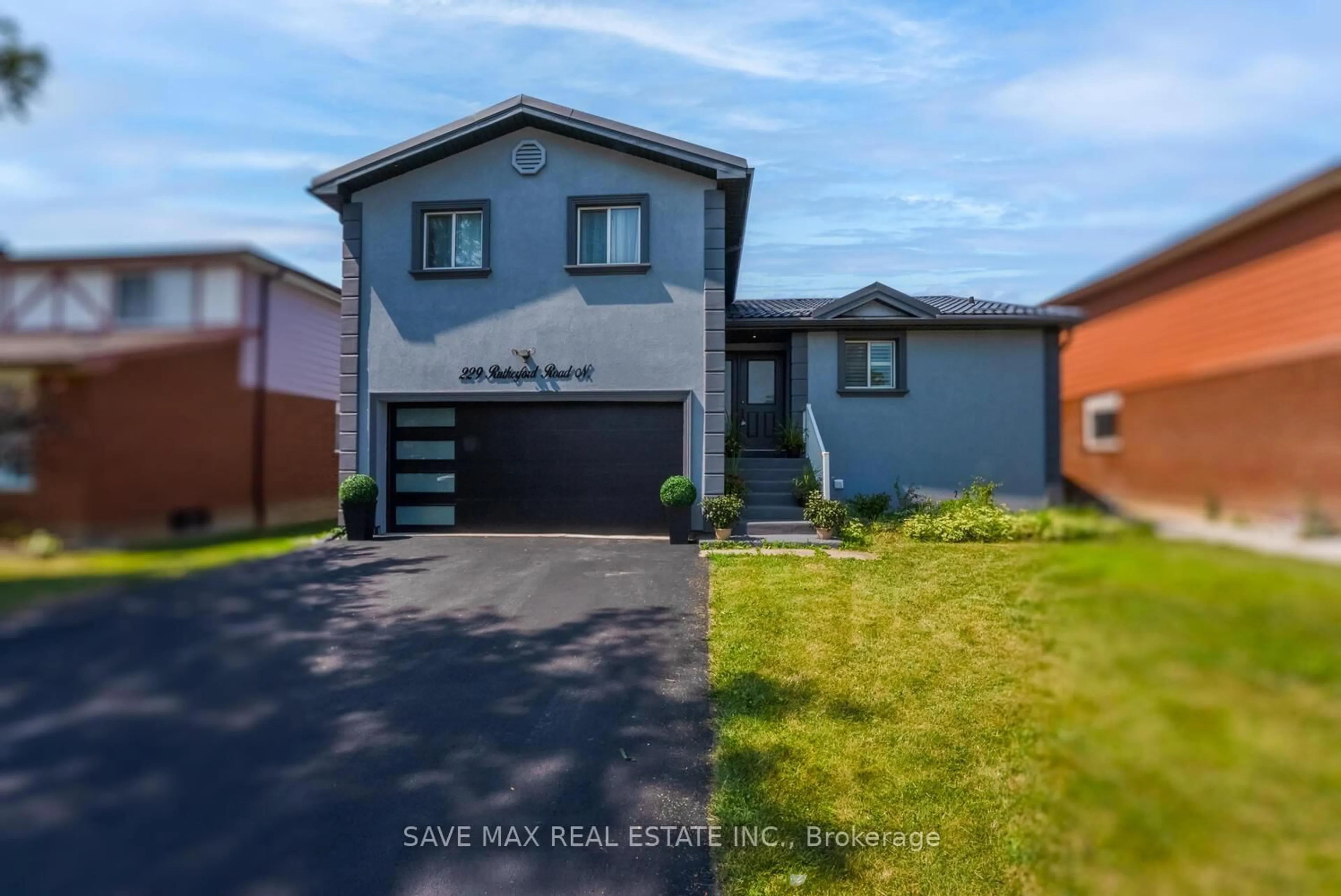 Home with vinyl exterior material, street for 229 Rutherford Rd, Brampton Ontario L6V 2X7