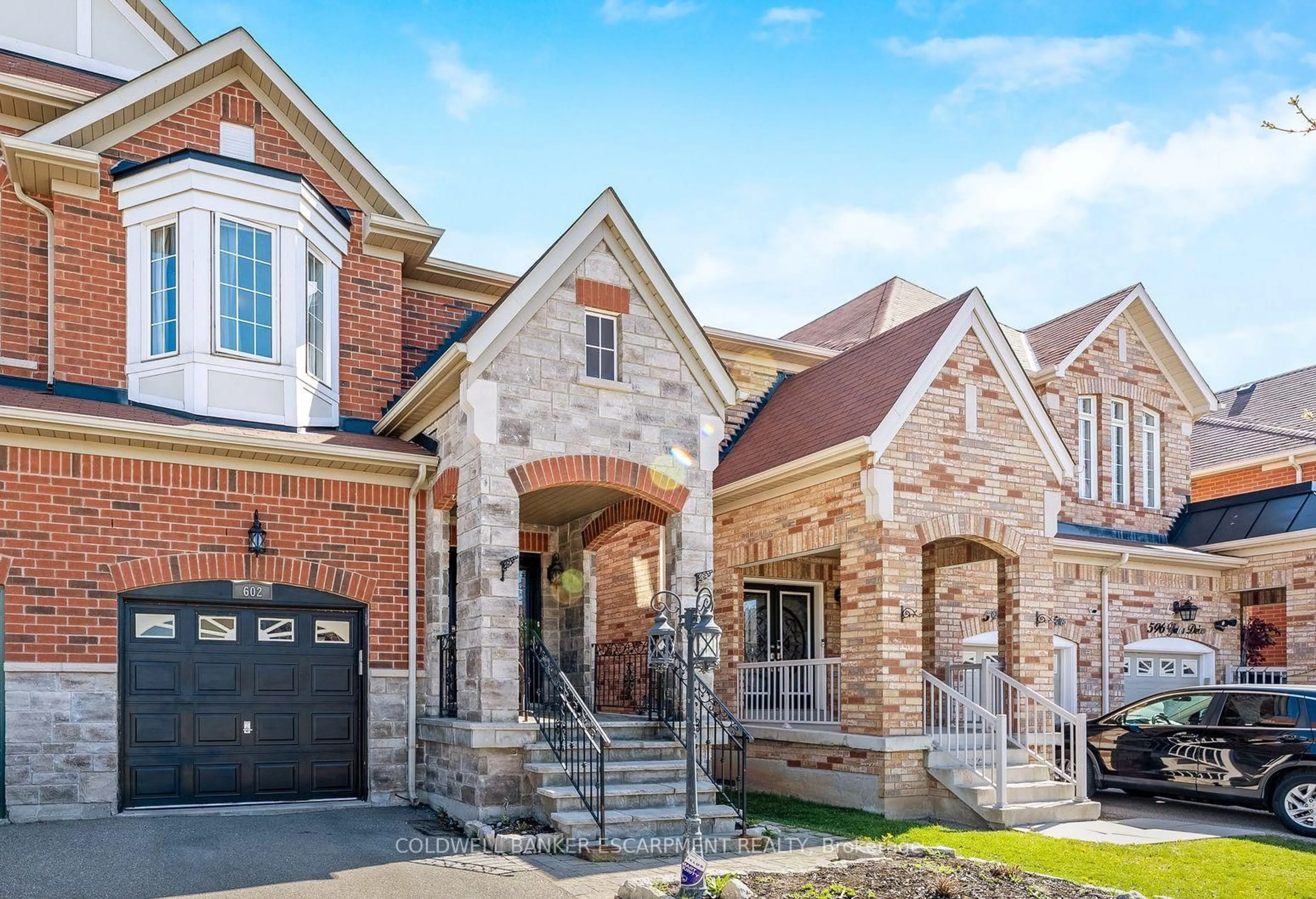 Home with brick exterior material, street for 602 Yates Dr, Milton Ontario L9T 7R1