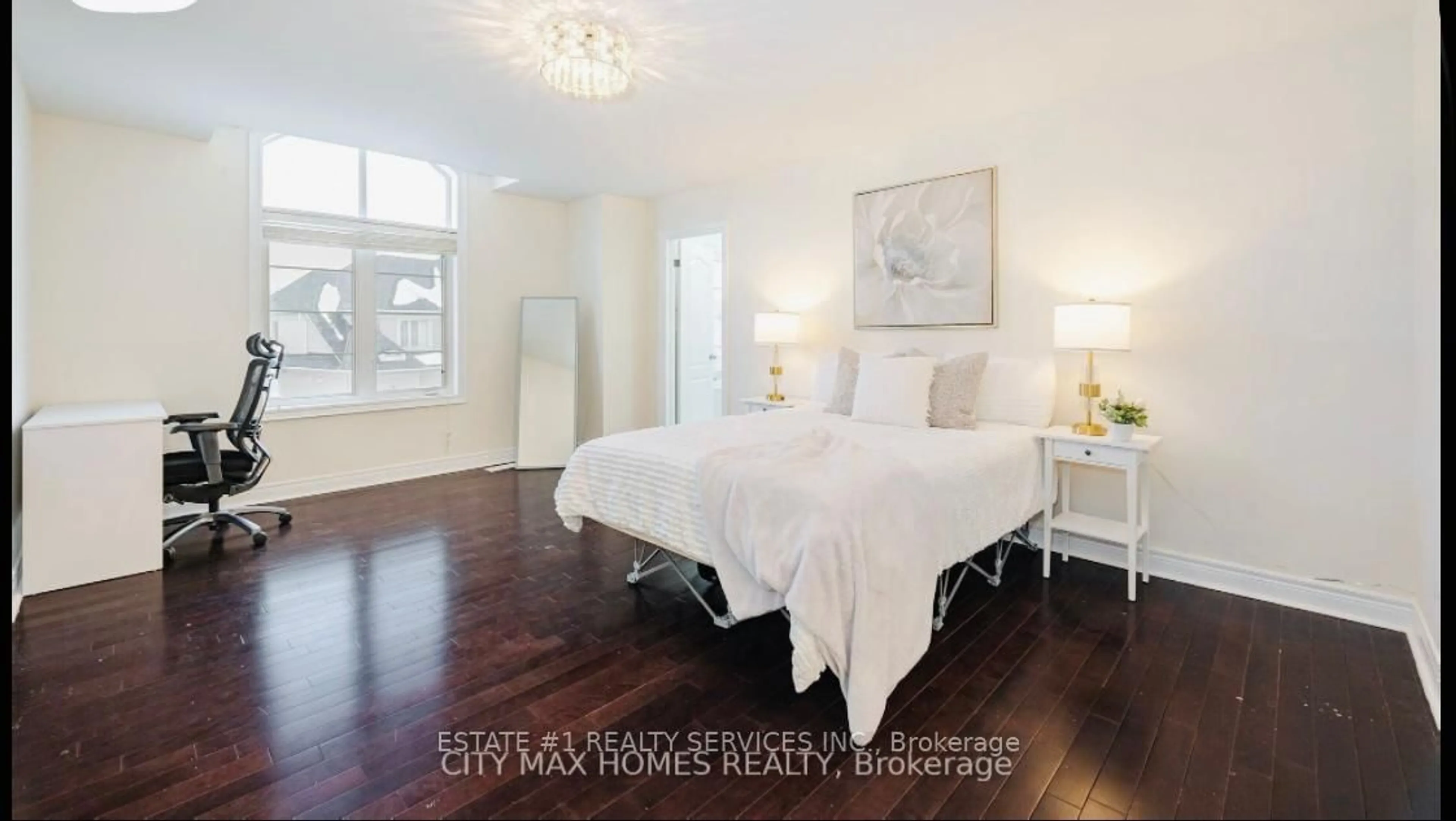 Bedroom with bed, wood/laminate floor for 57 Beacon Hill Dr, Brampton Ontario L6X 0V7