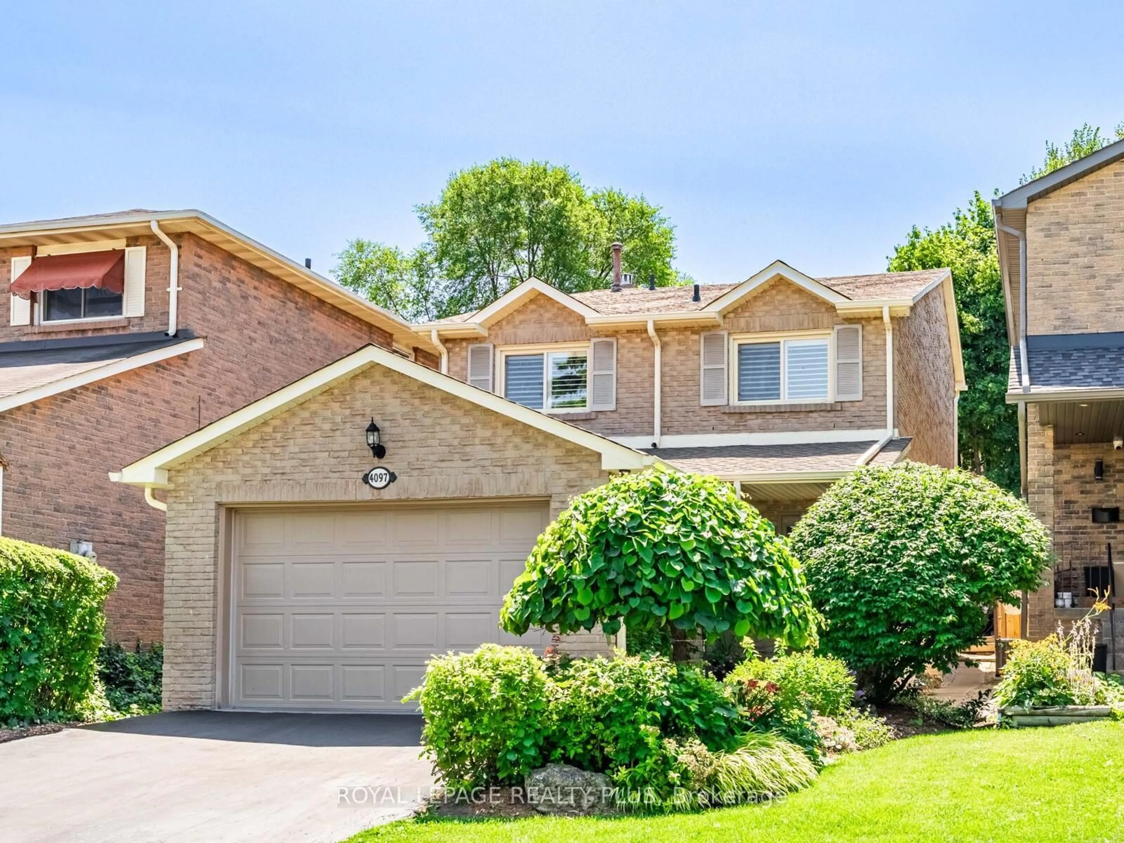 Home with brick exterior material, street for 4097 Trapper Cres, Mississauga Ontario L5L 3A7