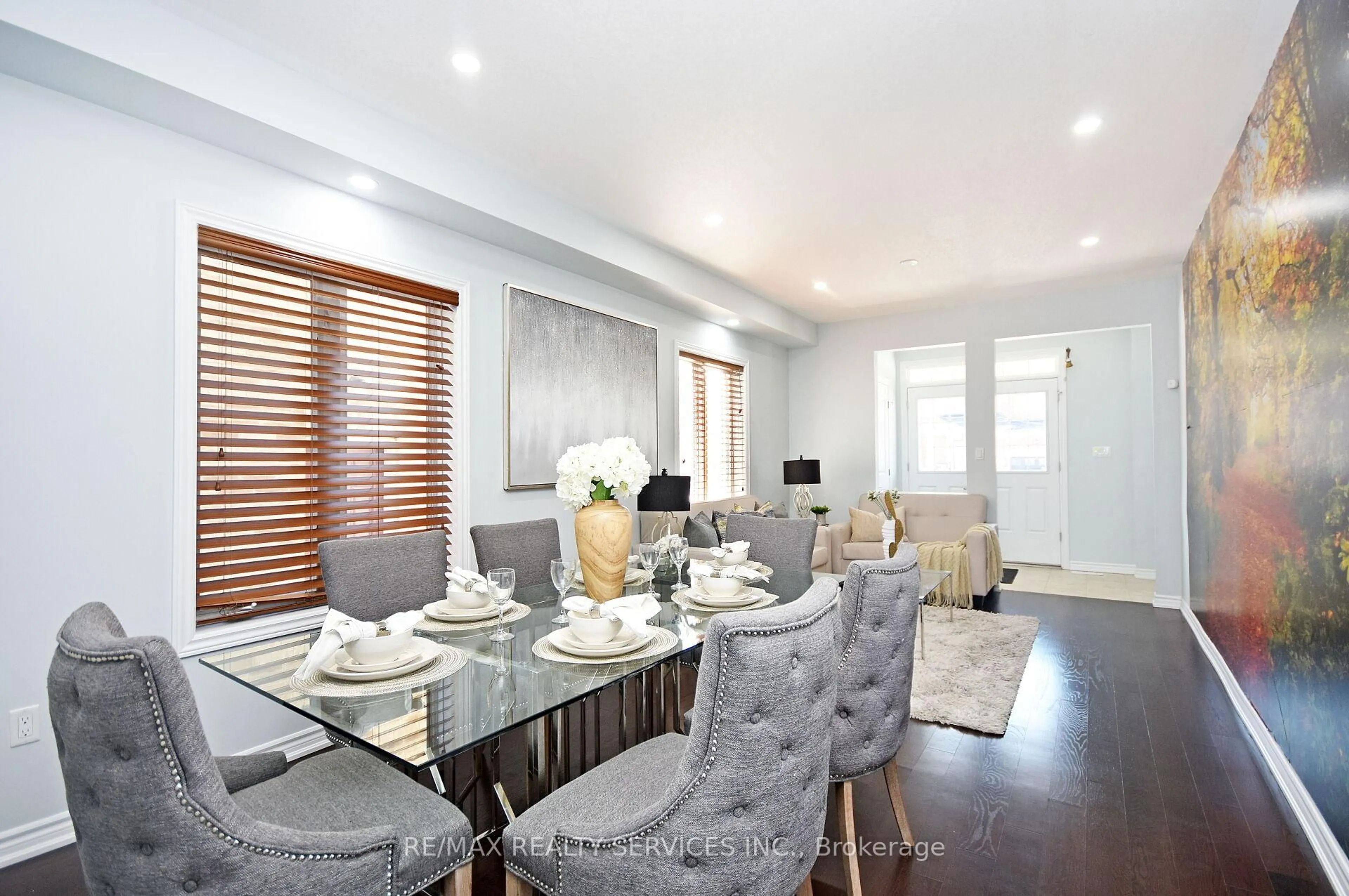 Dining room, wood/laminate floor for 21 Magical Rd, Brampton Ontario L7A 4P8