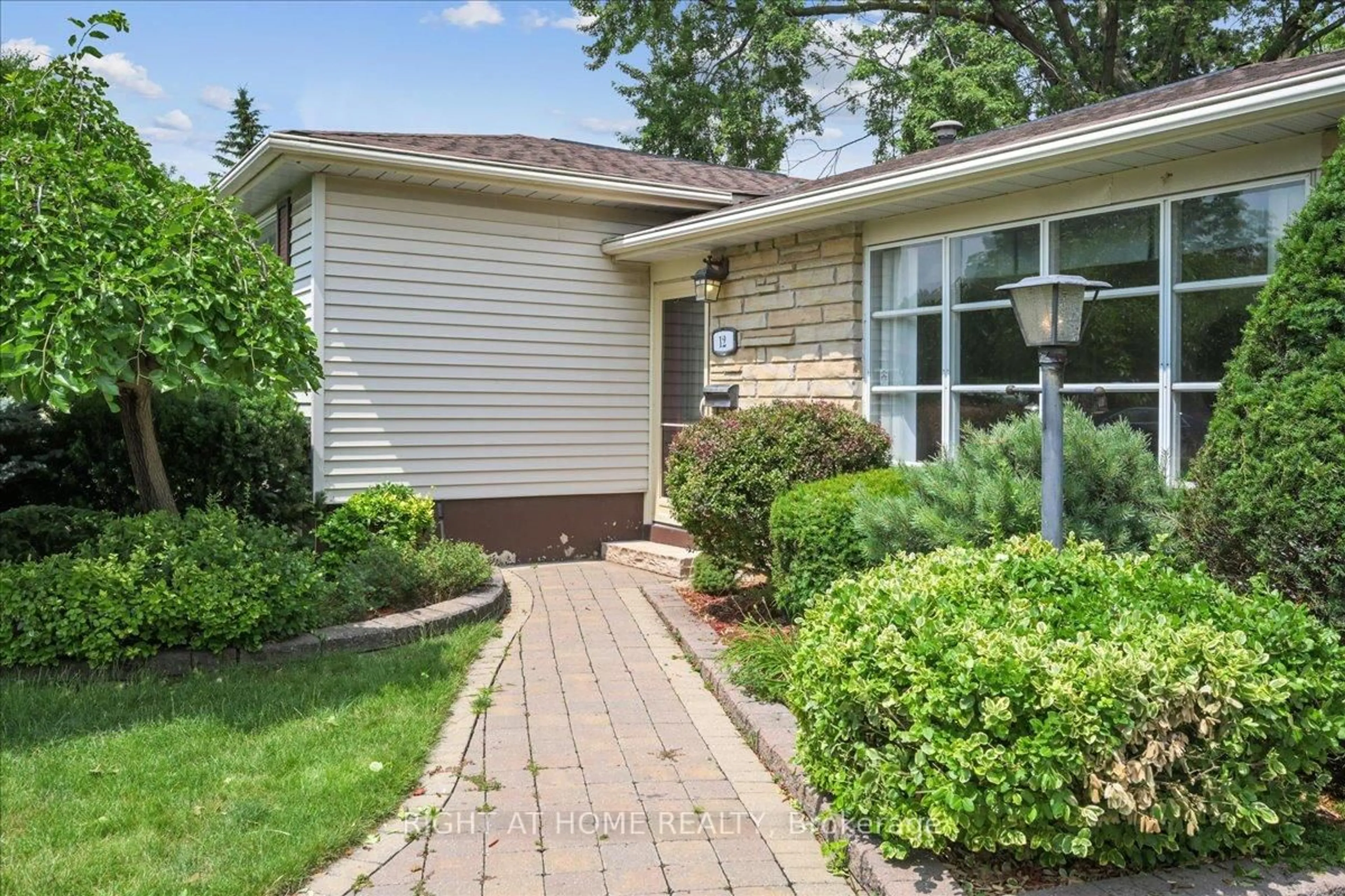Home with brick exterior material, street for 12 Eldon Crt, Brampton Ontario L6T 2B9