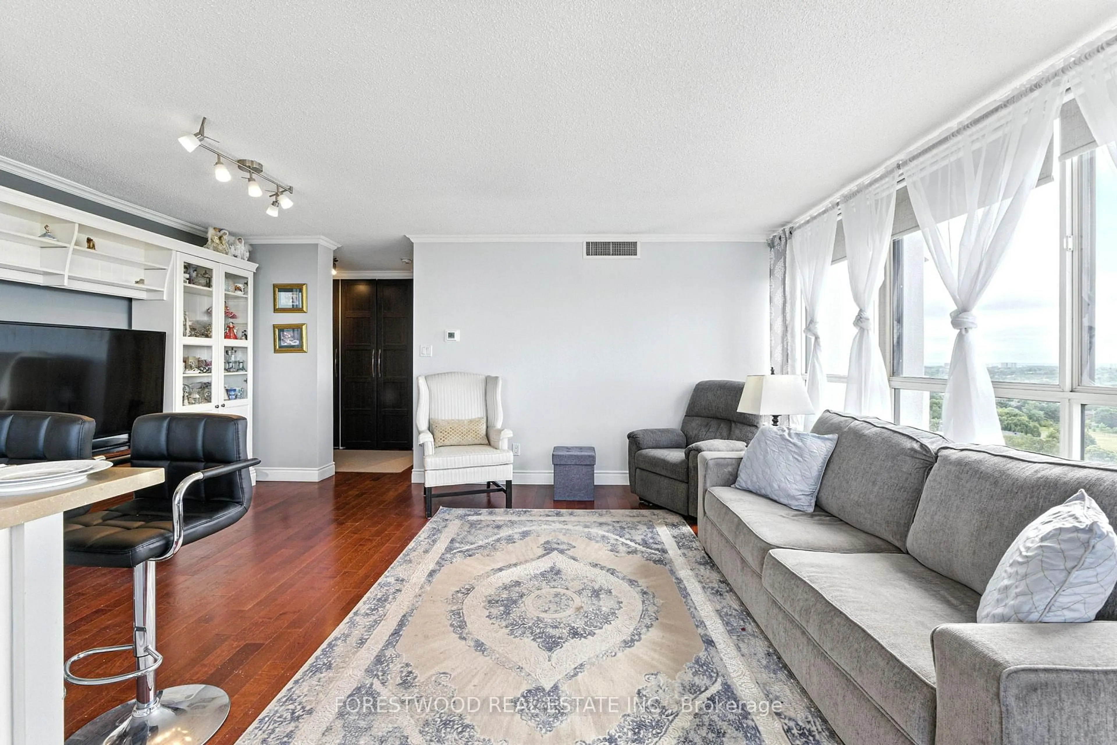 Living room with furniture, unknown for 1360 Rathburn Rd #1403, Mississauga Ontario L4W 4H4
