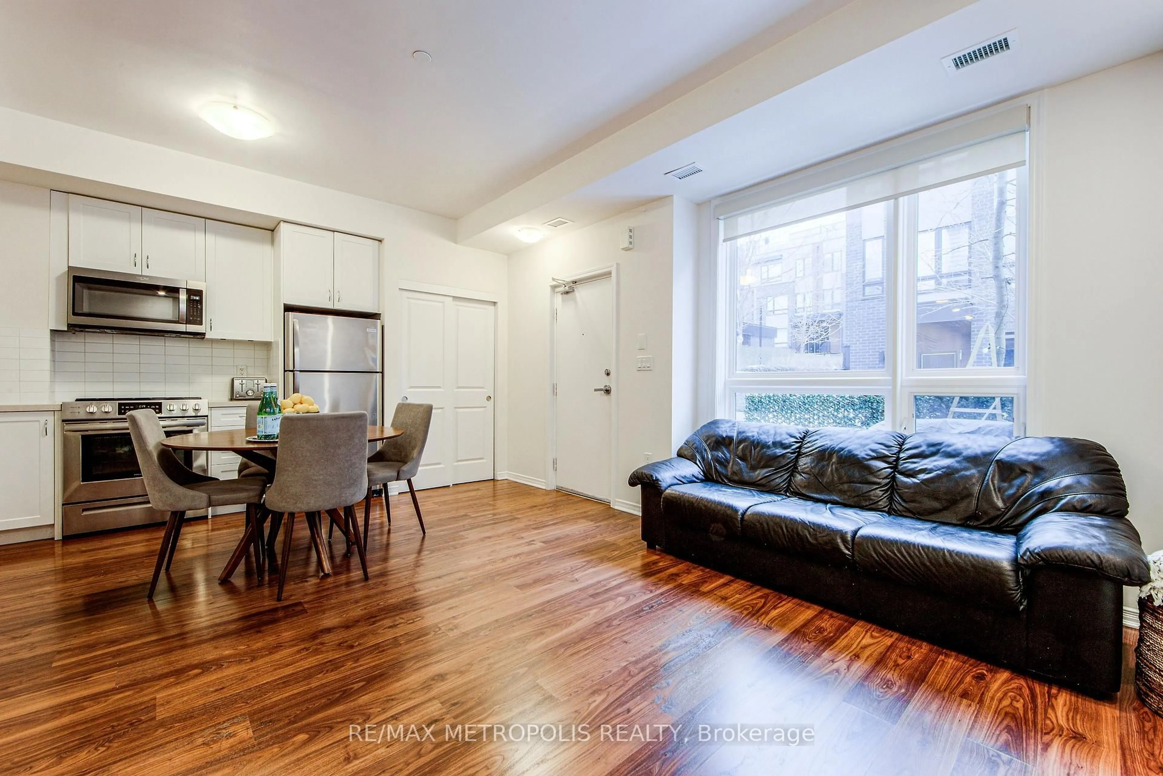 Living room with furniture, unknown for 1130 Briar Hill Ave #106, Toronto Ontario M6B 0A9