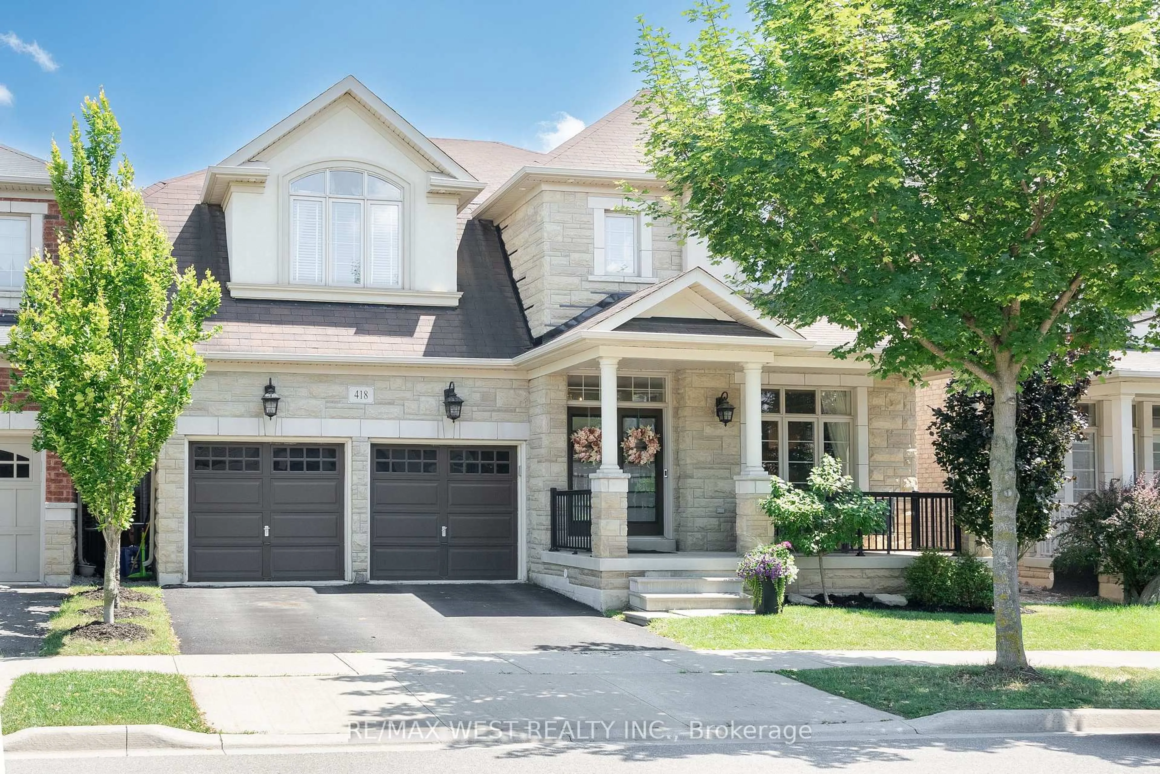 Home with brick exterior material, street for 418 Hidden Trail Circ, Oakville Ontario L6M 0N4