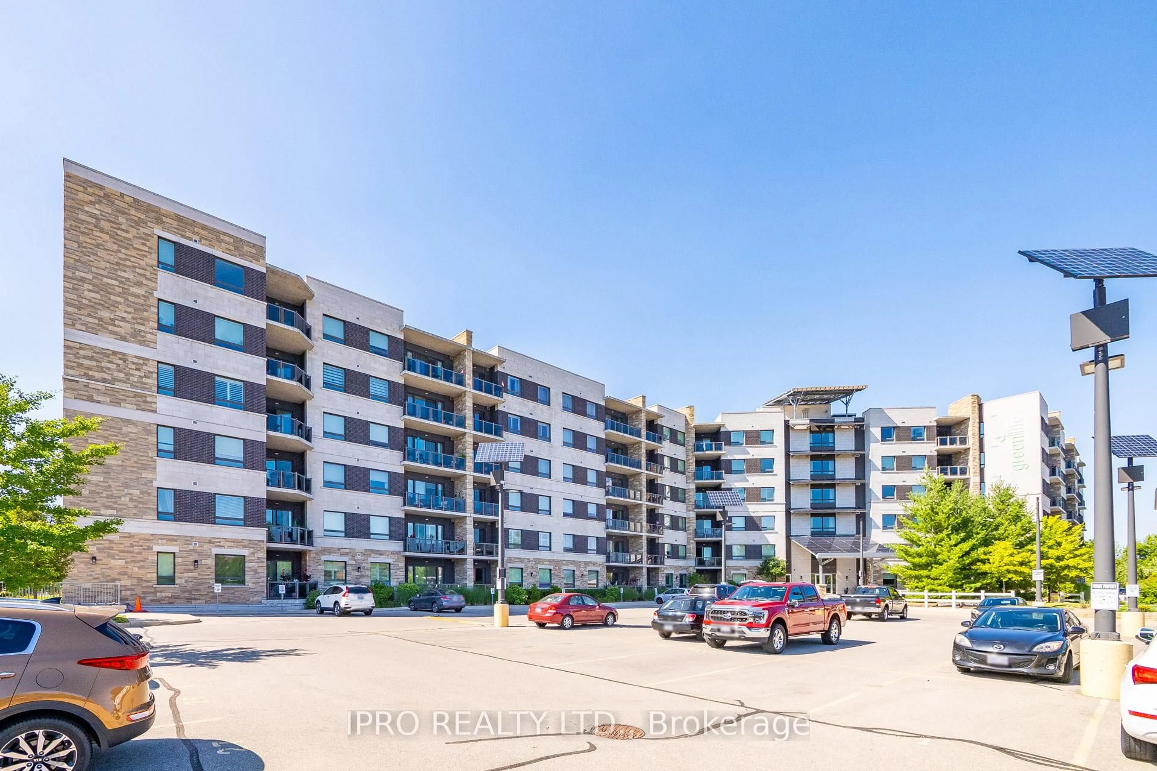 A pic from outside/outdoor area/front of a property/back of a property/a pic from drone, street for 33 Whitmer St #112, Milton Ontario L9T 8P9