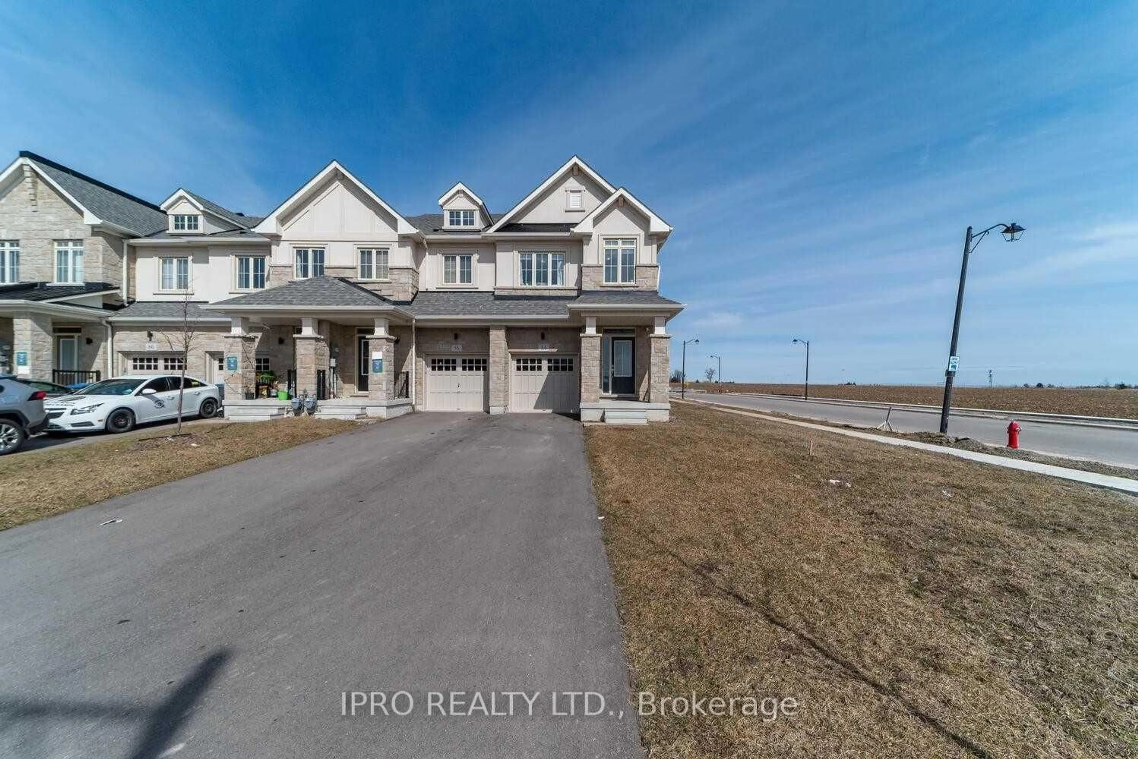 A pic from outside/outdoor area/front of a property/back of a property/a pic from drone, water/lake/river/ocean view for 54 Doris Pawley Cres, Caledon Ontario L7C 4E7
