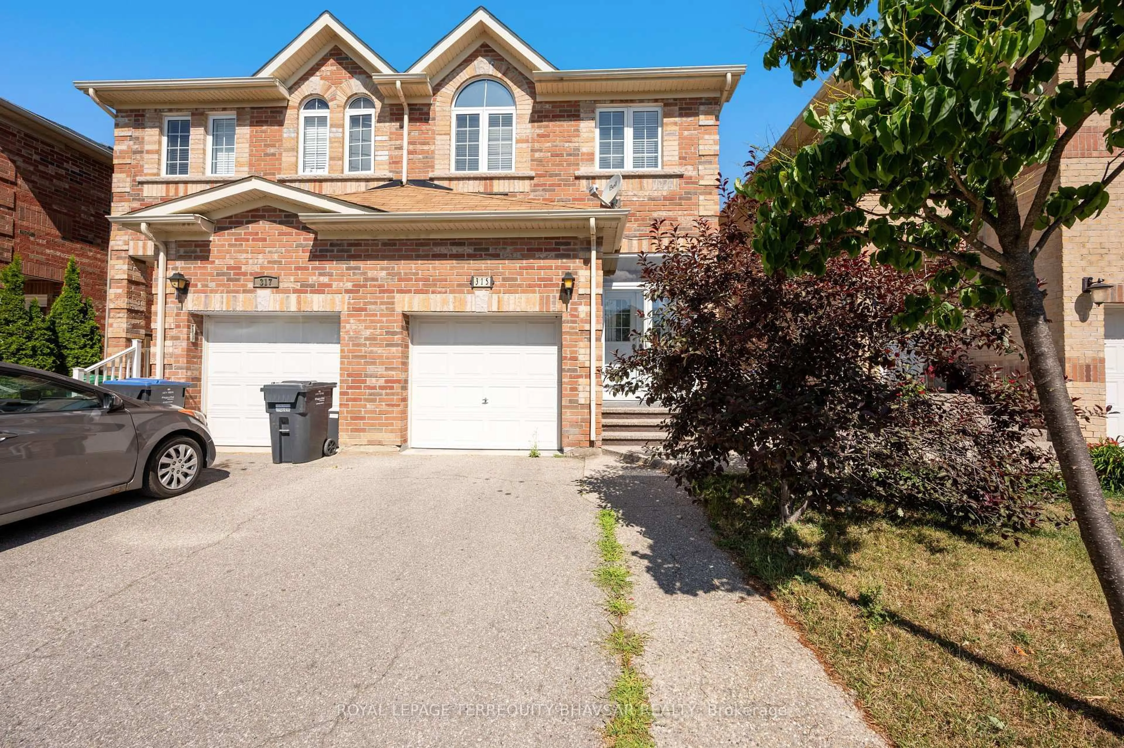 Home with brick exterior material, street for 315 Comiskey Cres, Mississauga Ontario L5W 0C5