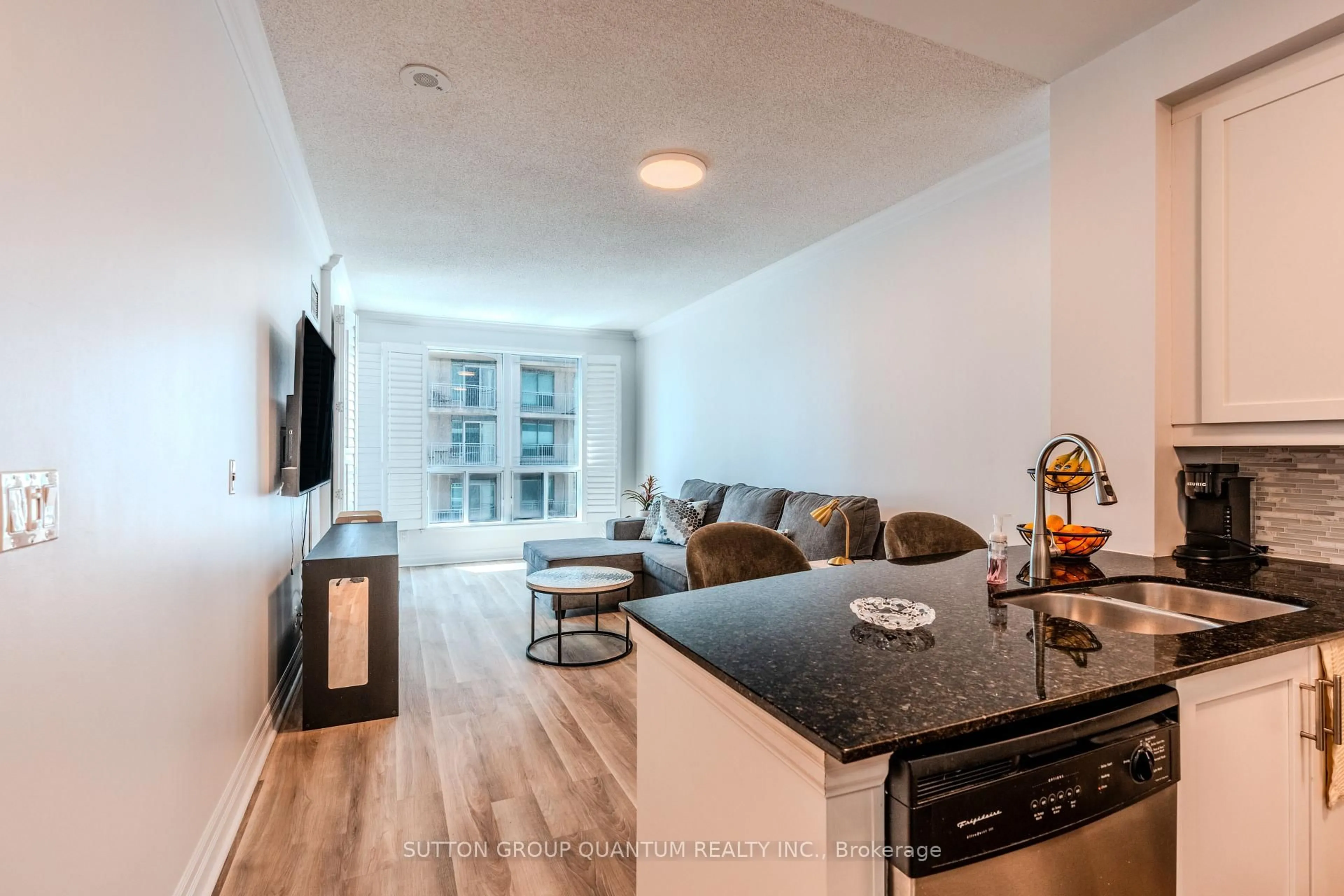 Living room with furniture, wood/laminate floor for 2087 Lake Shore Blvd #706, Toronto Ontario M8V 4G3